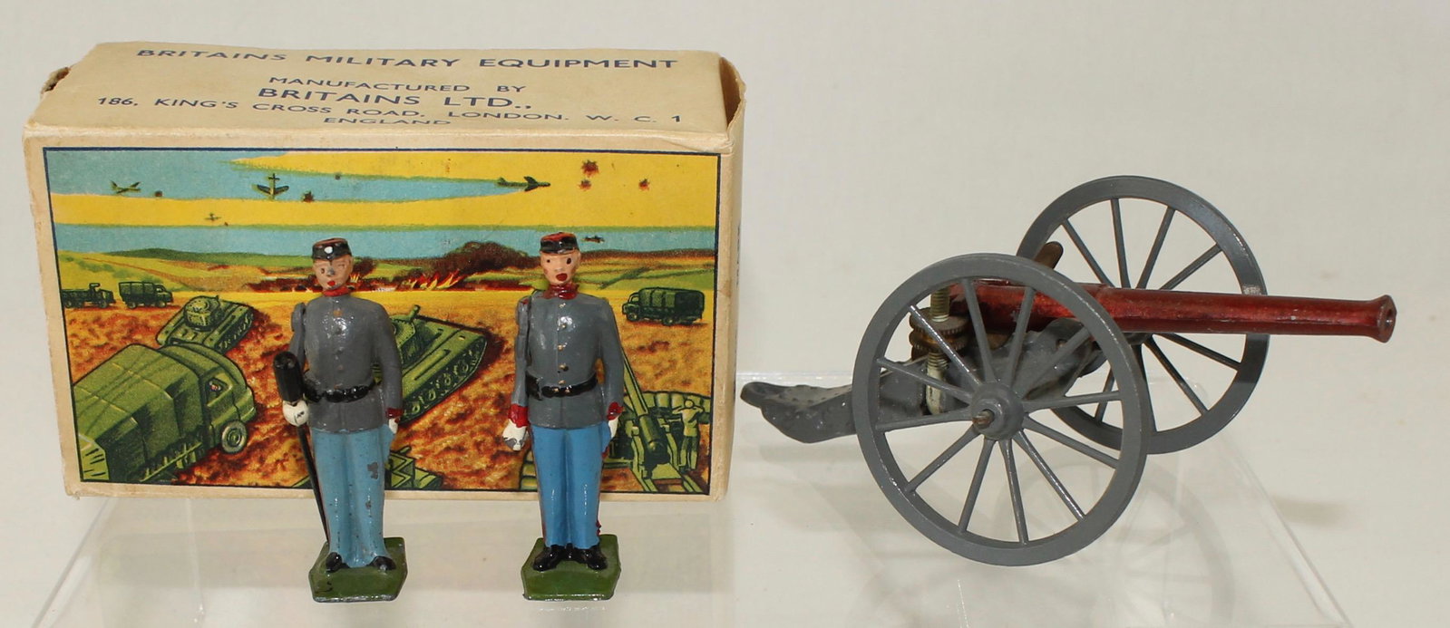 Britains Set #9486 ACW Confederate Gun and Crew: American Civil War Confederate Gun and Crew. Made 1962-65. 3 Pieces. Condition Very Good to Excellent. Gunners Mismatched Paint. Box Fair with Torn End Flaps.