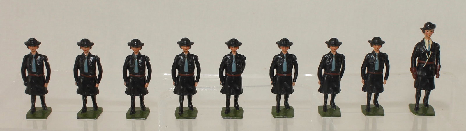 Britains Set #1332 Girl Guides with Guider: Girl Guides with Guider. Rare. Made only 1934-39. 9 Pieces. Condition Excellent. No Box.