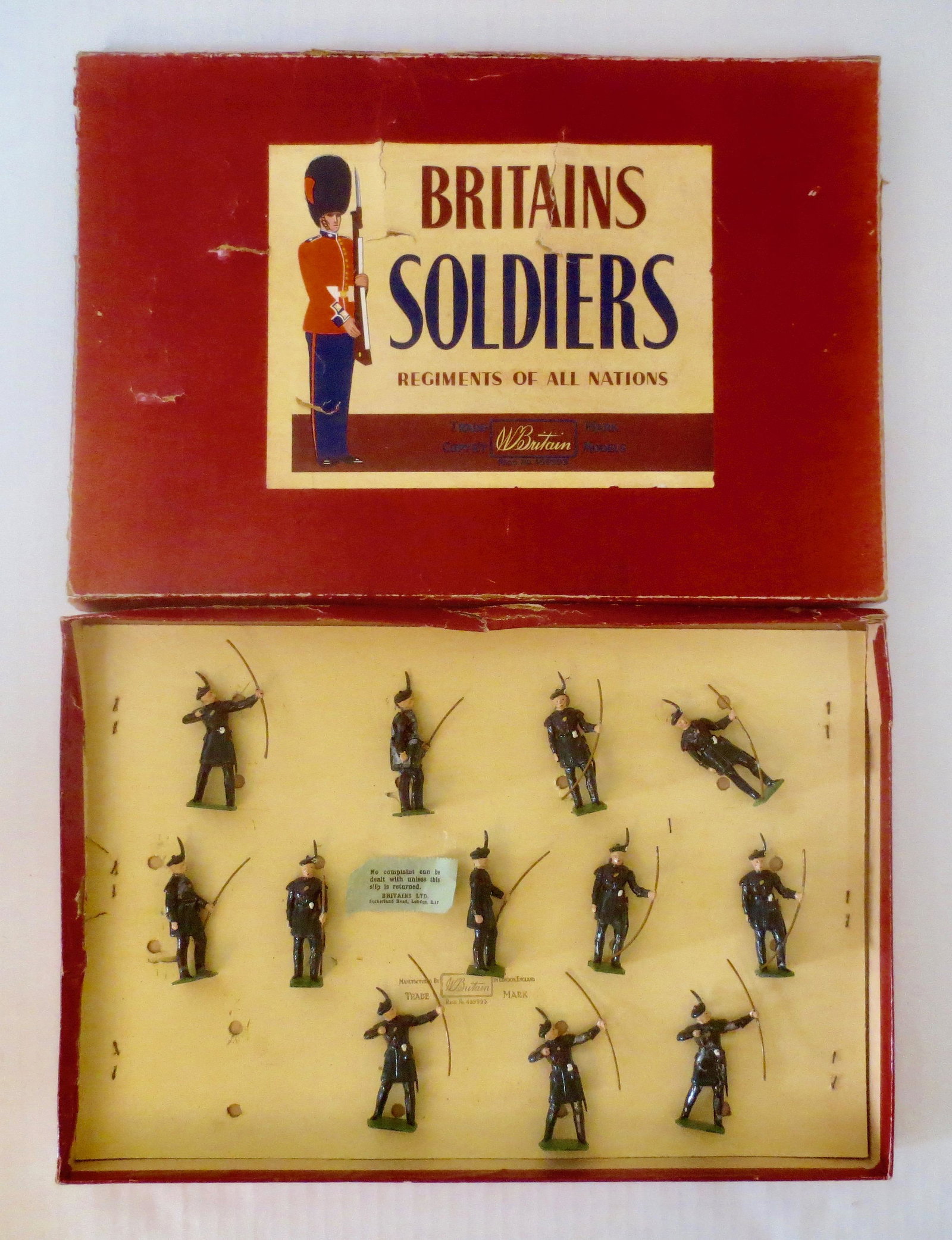 Britains #2079 Royal Company of Archers: The Royal Company of Archers, Queen's Bodyguard for Scotland. Post war, unstrung in ROAN box. 12 pieces, missing officer. Very good to fair condition (two figures have crushed bodies). Box poor, with 