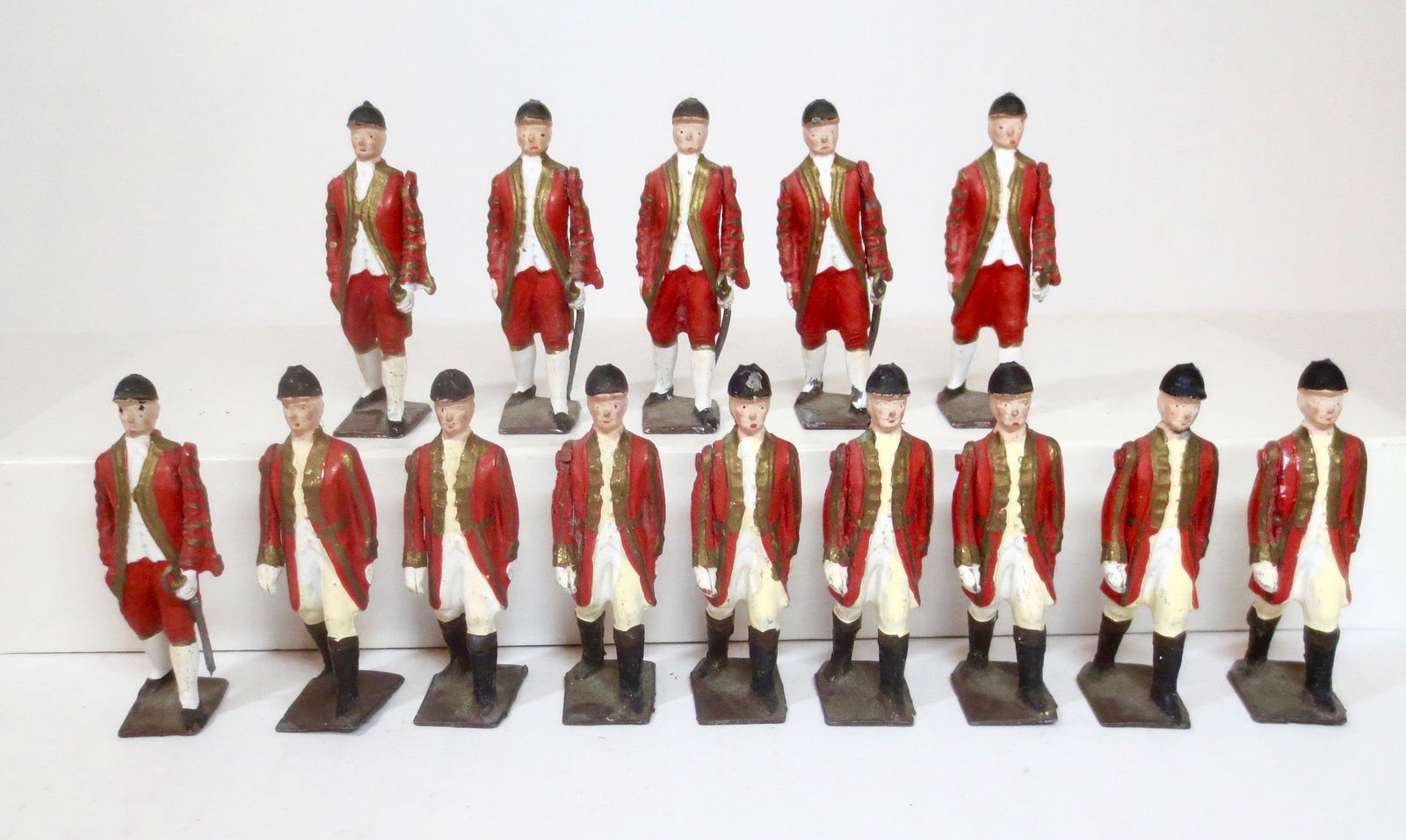 Britains From #9404 State Coach Attendants: Attendants for State Coach. 14 pieces. Good condition, with wear (some retouching and one broken sword). Unboxed.