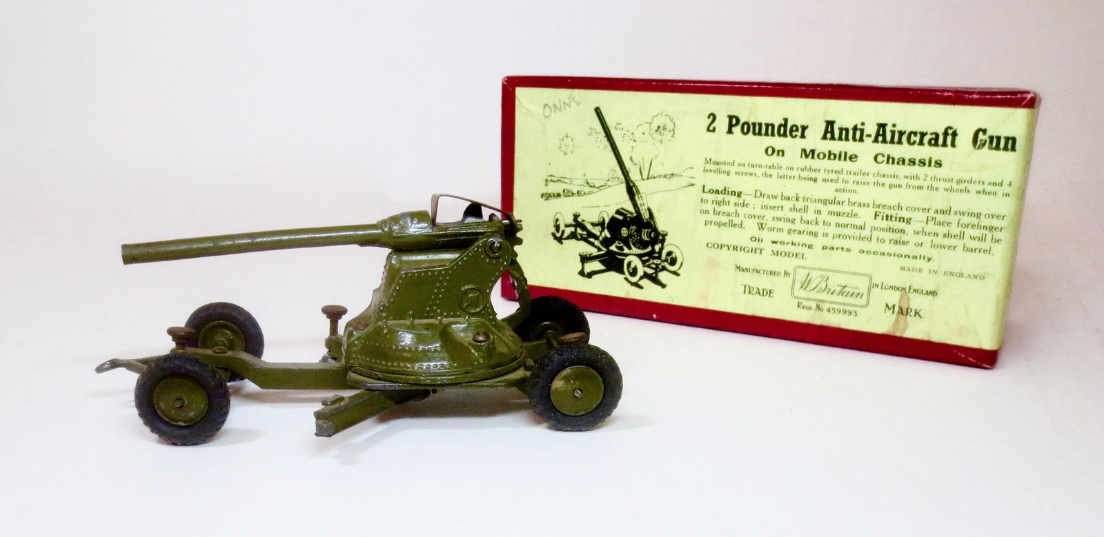 Britains #1717 Anti-Aircraft Gun: A.A. 2 Pounder Gun on Mobile Chassis. 1939 version Very good condition (one side arm missing screw and base). Box very good.