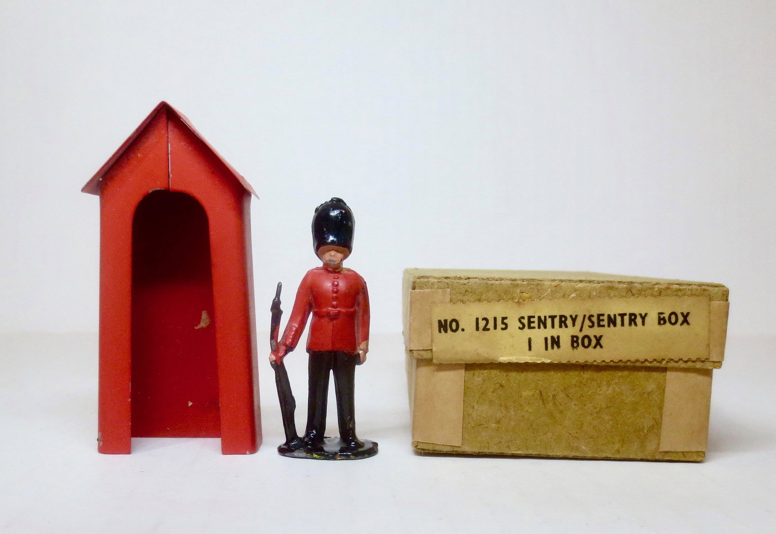 Crescent #1215 Sentry and Harvey Sentry Box: British Sentry on Guard. Comes with original tin Sentry Box. 2 pieces. Excellent condition. Box excellent.
