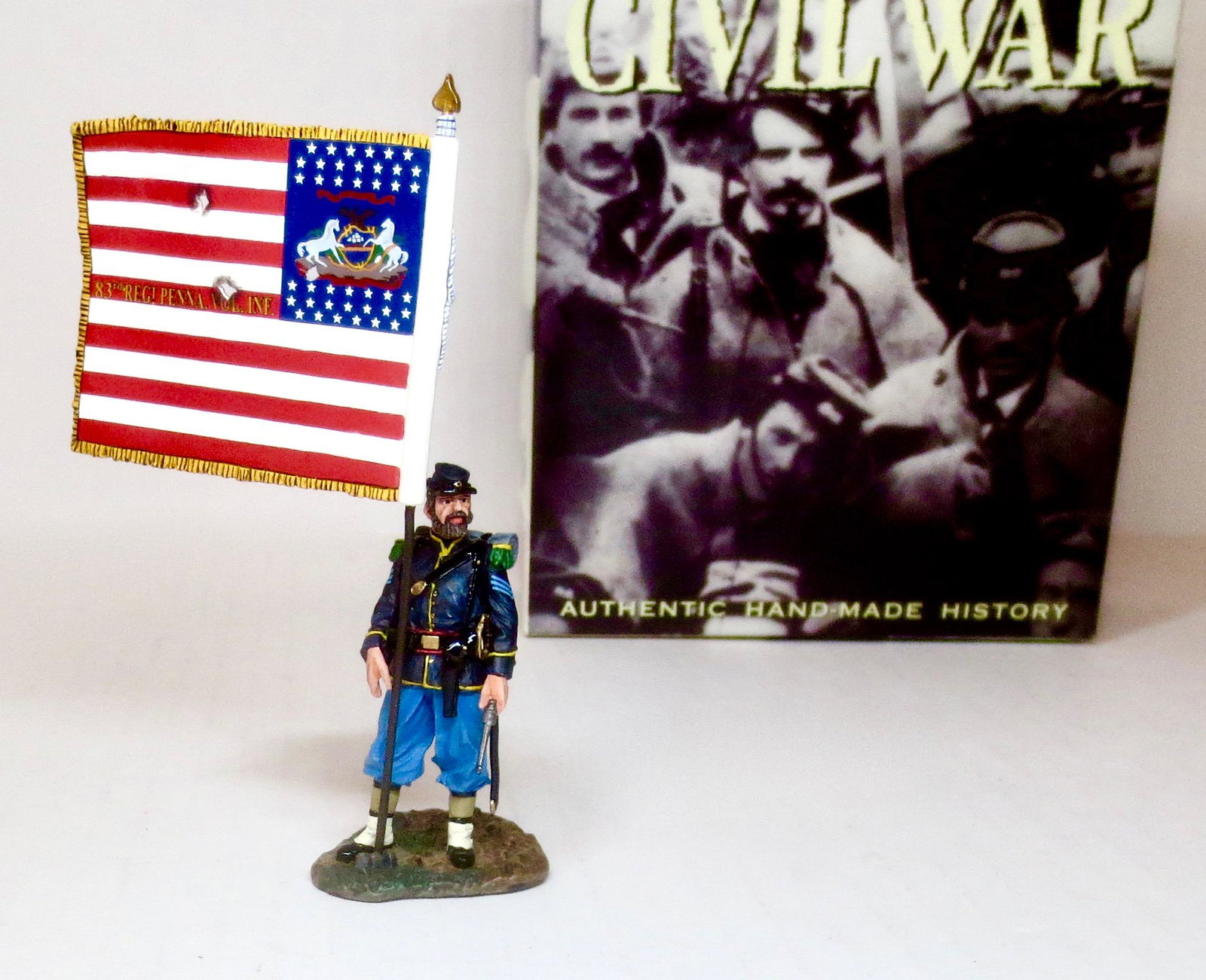 King & Country #CW036 Union Sergeant with Flag: From The American Civil War series. Retired. 1 piece. Near mint in box. Box excellent.