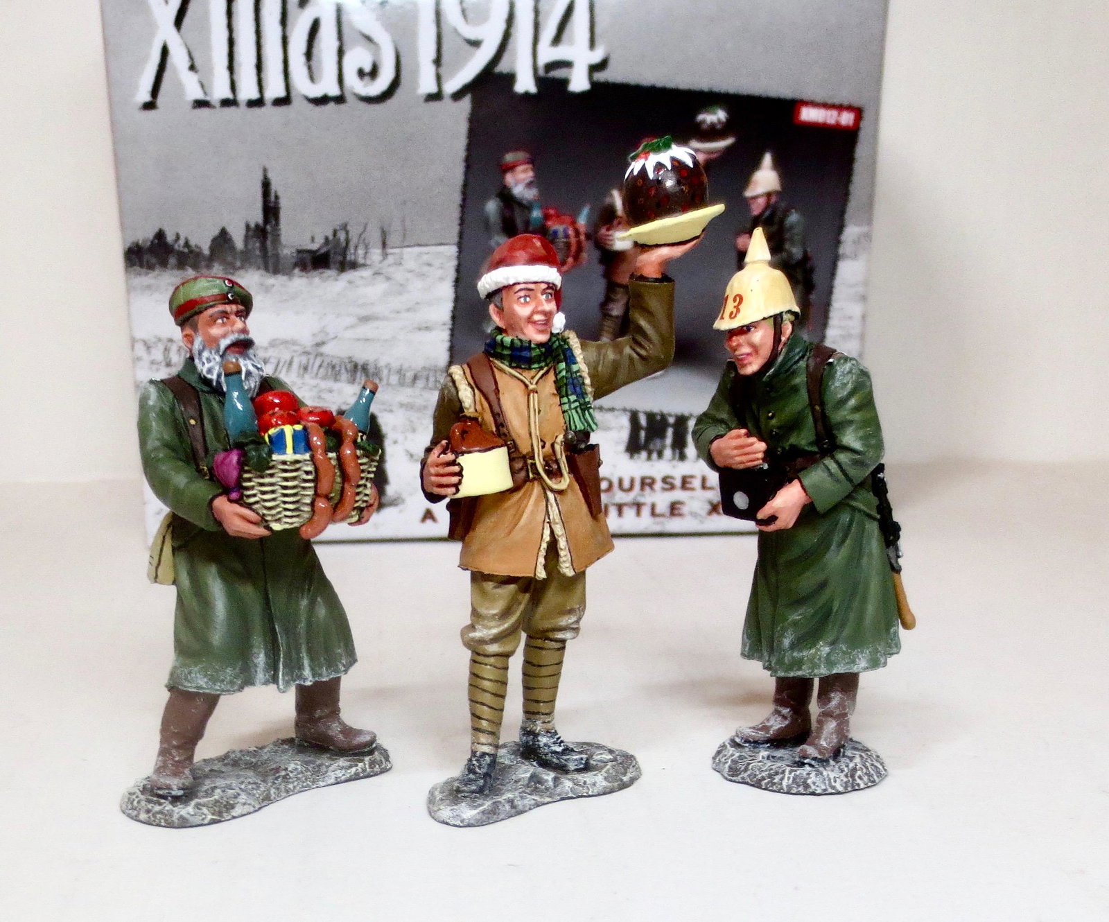 King & Country #XM012-01 Christmas 1914: Depicts a scene from the incredible Christmas of 1914 when the Brits and Germans put a halt to the fighting and celebrated the spirit of Christmas together. Retired set. 3 pieces. Near mint condition.