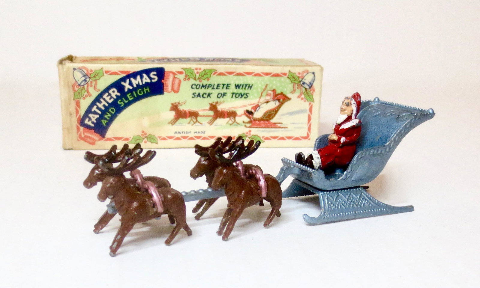 Benbros RARE Father Xmas and Sleigh: Santa Claus in his sleigh, being pulled by 4 Reindeer. 6 pieces. Excellent condition (missing Santa's bag). Box Very Good.