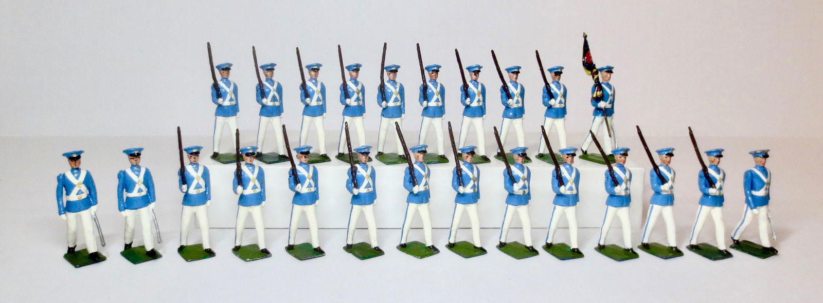 Britains From #2099 Venezuelan Cadets: Military School Cadets. Circa 1955-1959. 24 pieces. Retouched. Mismatched bases. Unboxed.
