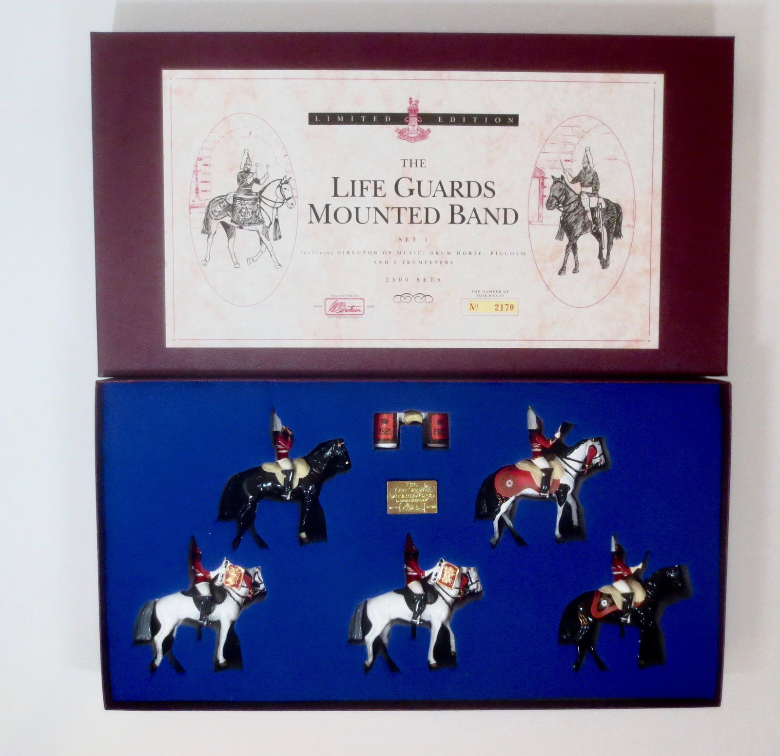 Britains #5195 The Life Guards Mounted Band: Limited Edition. Featuring ; The Director of Music, Drum Horse, Piccolo and 2 Trumpeters. 5 pieces. Mint in box. Box mint with outer sleeve.