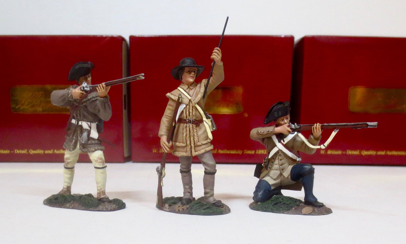 Britains Clash of Empires Assortment: 3 pieces. Including: Colonial Militia Firing (#16035), Colonial Militia Loading (#16036), and Colonial Militia Kneeling (#16037). Near mint condition. Boxes excellent.