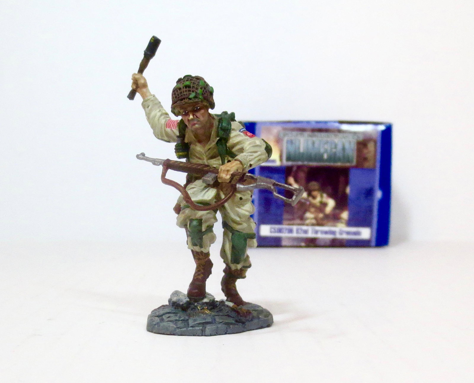 Collectors Showcase #CS00296: 82nd Infantryman Throwing Grenade. From the Operation Market Garden Nijmegan series. 1 piece. Near mint condition. Box excellent.