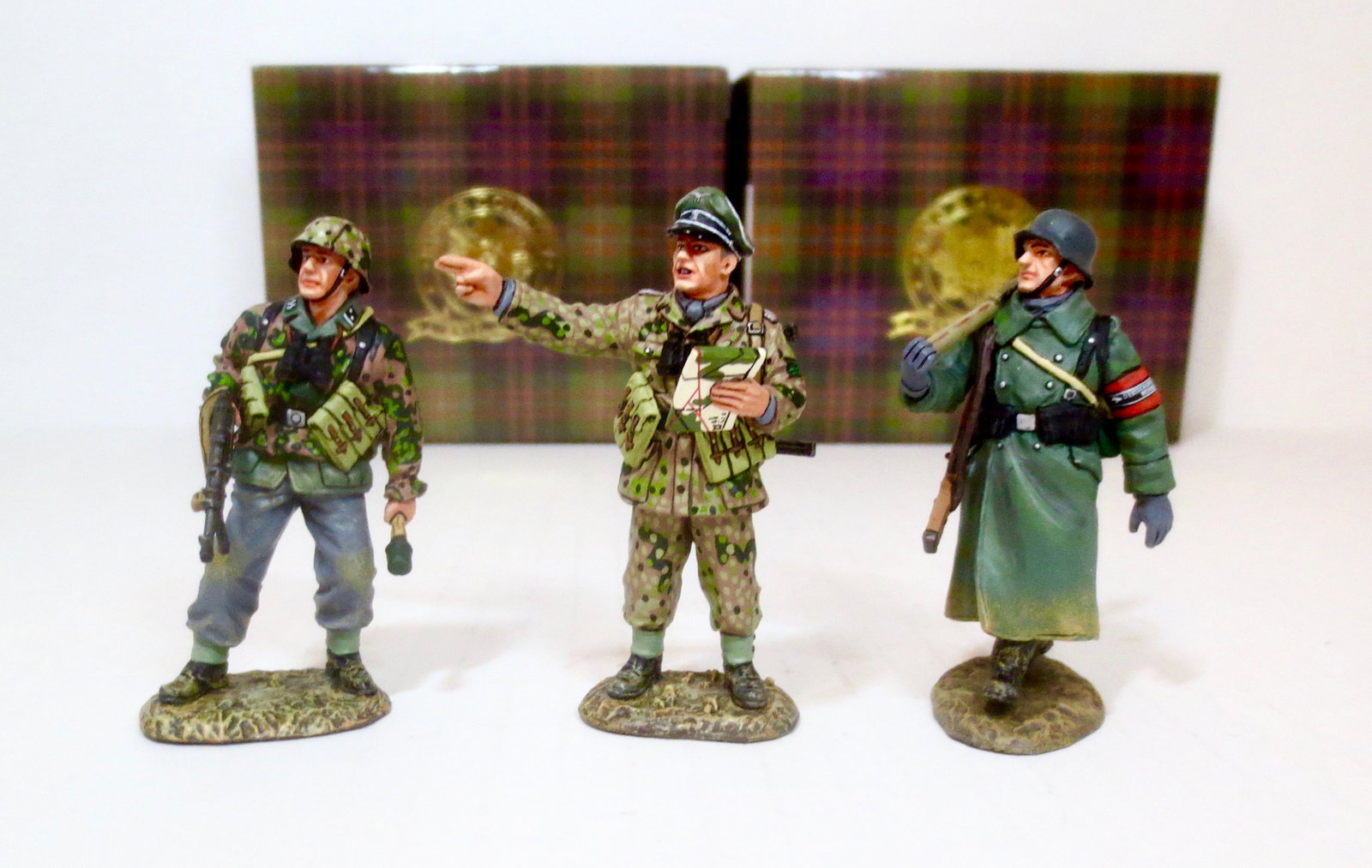 King & Country #WS173 and #WS182: The “Panzer Meyer Set”, and "Volksturm off to Battle". Both Retired Sets. 3 pieces. Near mint in boxes. Boxes excellent.