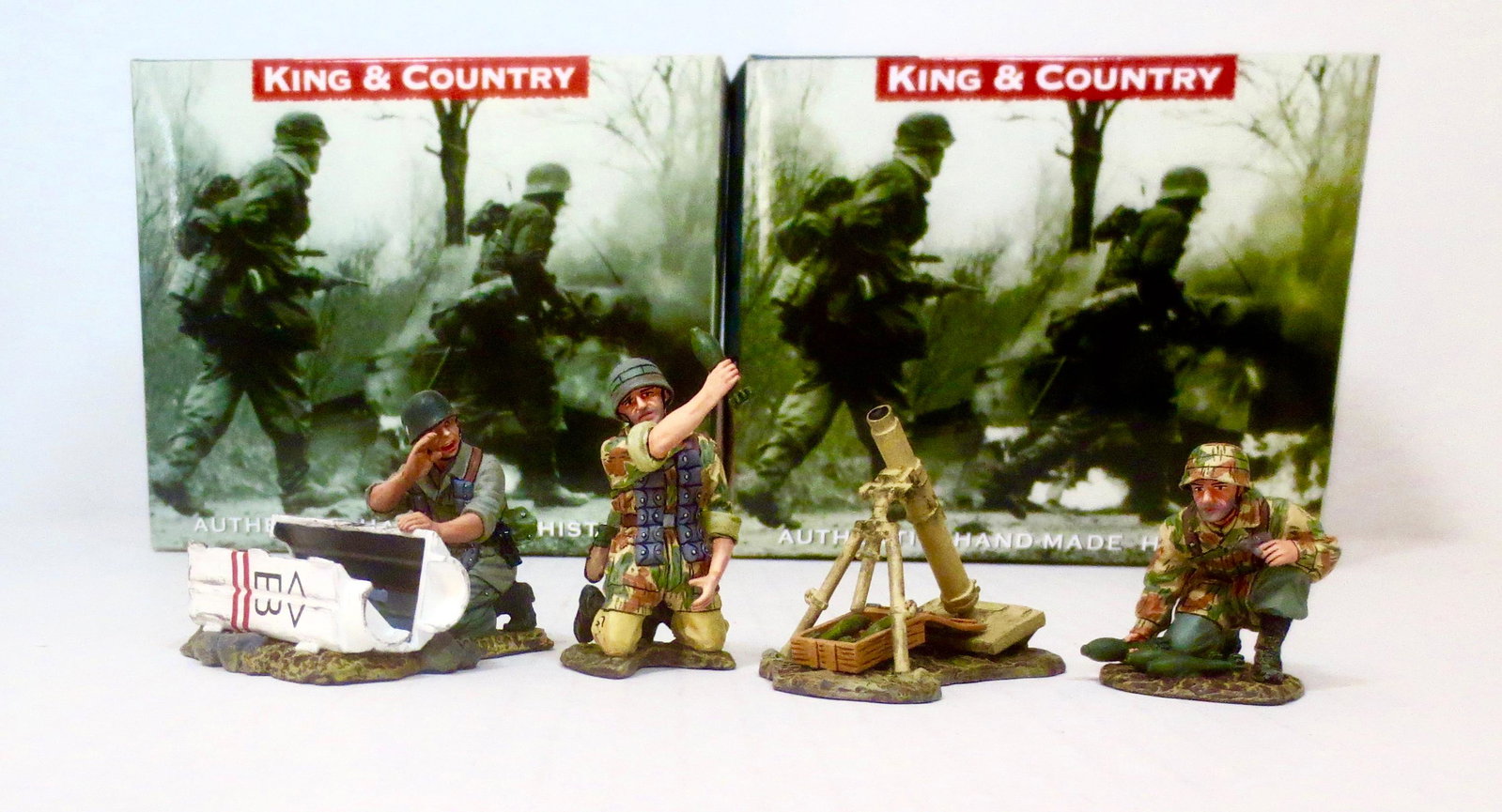 King & Country #FJ015 & FJ003-07 Fallschirmjager: Mortar Team, and Weapons Container. Retired sets. 4 pieces. Near mint condition. Boxes excellent.