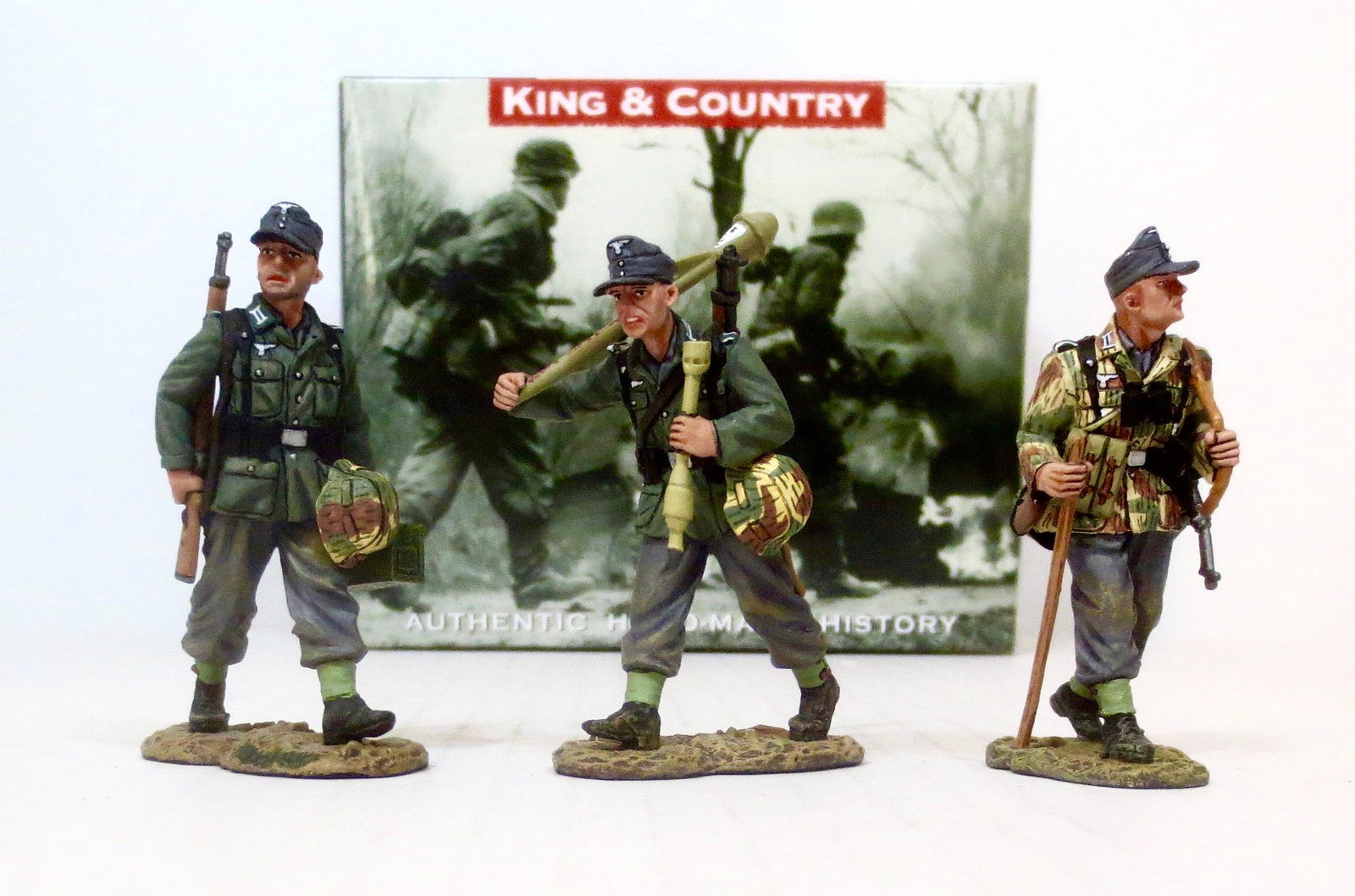 King & Country #WS119 "On the Road": An NCO leads two of his riflemen to the front carrying extra ammo and weapons. 3 pieces. Retired set. Near mint condition. Box excellent.