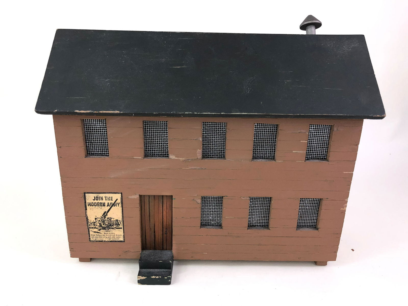 Army Barracks: Made to an expert standard and in a Britains style. The barrack measures 11x9-1/4 inches. Removable roof. Made of wood.