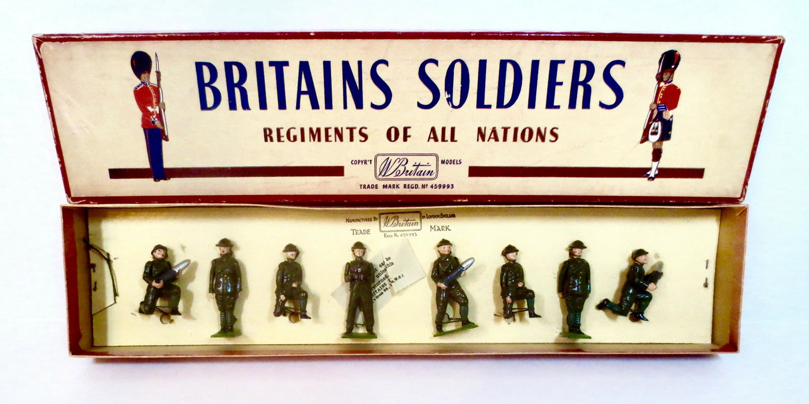 Britains #1730 The Royal Artillery: Gun Detachment with Observer. Post war, tied to card in ROAN box. 8 pieces. Mint condition. Box excellent.