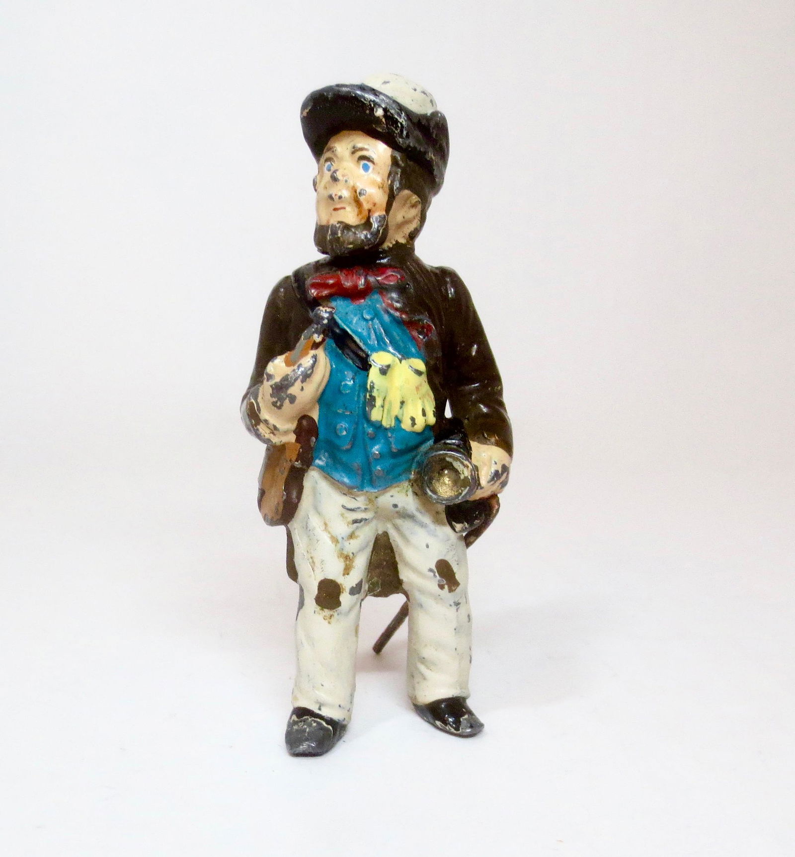 Heyde Large Scale Gent with Violin: Musical fellow with Violin tucked under one arm. 85mm tall. Very good condition, with some paint loss.