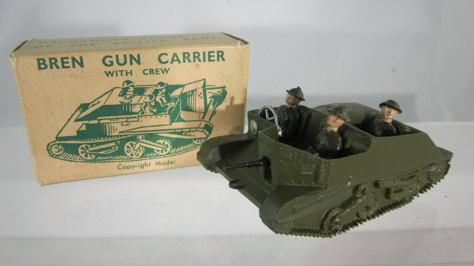 Britains Set #1876 Bren Gun Carrier With Crew.: Boxed Bren Gun Carrier with 3 crew. 4 pieces circa 1950s. Condition Mint in excellent box.