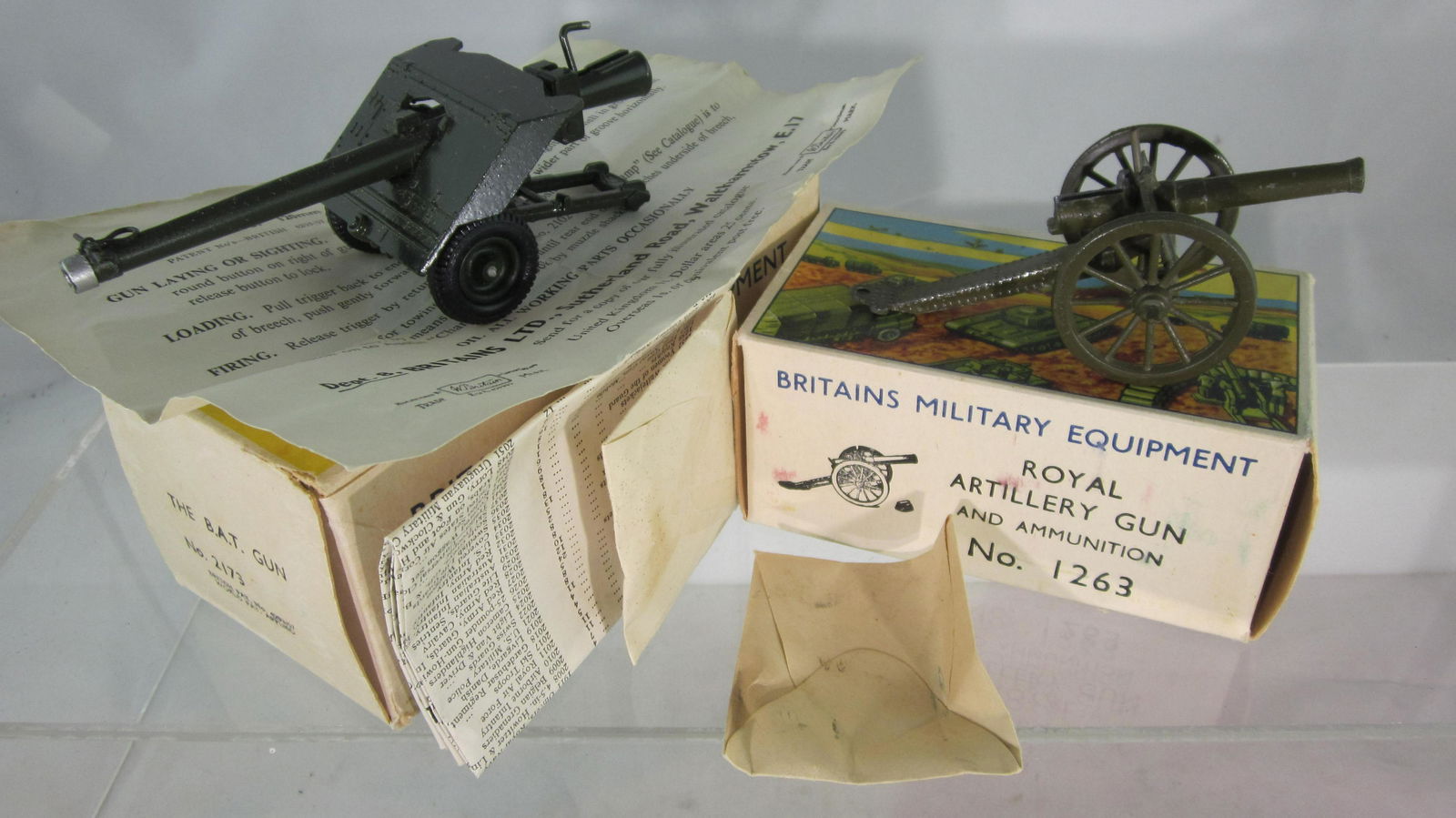 Britains Royal Artillery Gun & Anti-Tank Gun.: 2 Boxed sets, #1263 small Royal Artillery Gun, & #2173 B.A.T. Gun. 2 pieces circa 1950s. Condition of #1263 is excellent in excellent box. Condition of #2173 is Mint in excellent box.