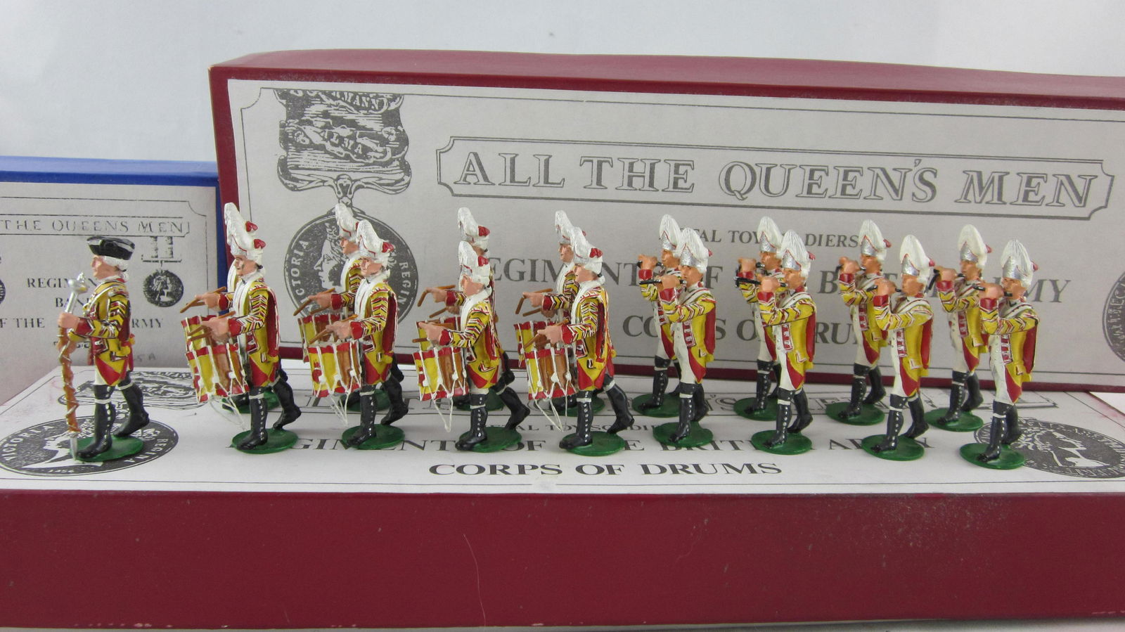 All Queen's Men #TB125 25th Foot Drums & Fifes.: Boxed AQM #TB125 25th Edinburgh Regiment of Fifes & Drums circa 1700 with Drum Major. 17 pieces, wonderfully detailed paintwork, circa 1970s, in 3 boxes. Condition excellent in 3 excellent boxes.