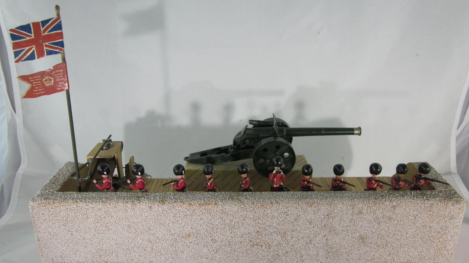 Scotoyz-Made Exploding Trench With Troops.: UNBOXED unique Exploding Trench, 16" long, rubber band tension, complete with Britains Grenadier Guards to man the trench & 4.7 Naval Gun to destroy it…hit the flag, trench floor flips back upsettin