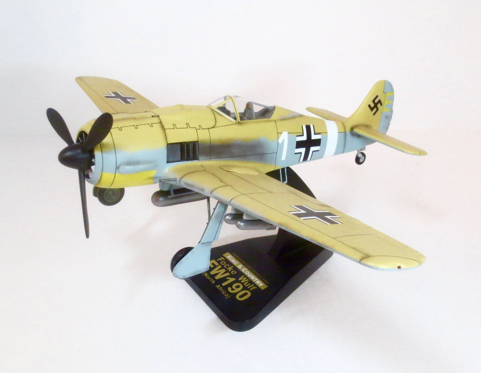 King & Country VERY RARE Mahogany War Bird: Focke Wulf FW-190. Limited edition production. K&C “WARBIRDS” are miniature 1:30 scale aircraft models of the highest caliber. Each is hand-carved (from the finest kiln-dried mahogany) and hand-pa