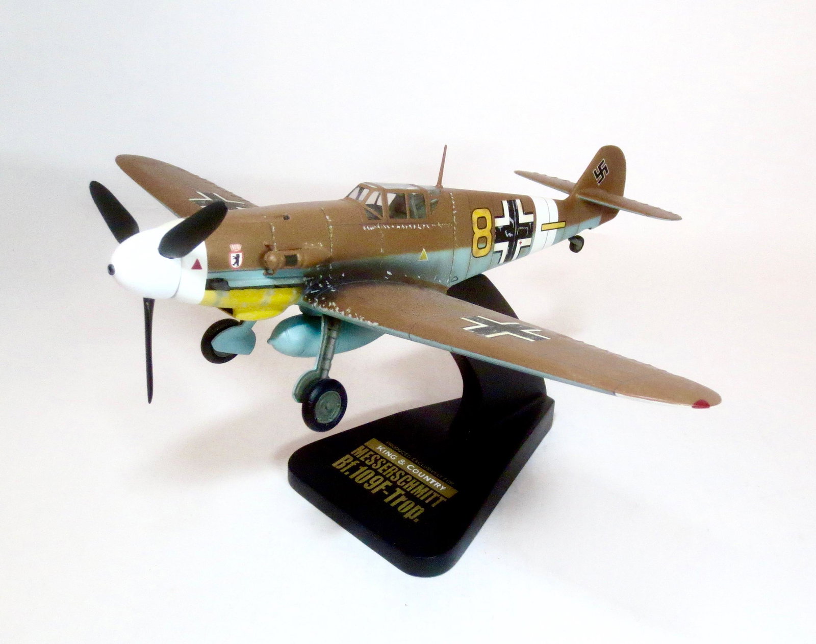 King & Country VERY RARE Mahogany War Bird: ME-109F Tropical Version. Limited edition production. K&C “WARBIRDS” are miniature 1:30 scale aircraft models of the highest caliber. Each is hand-carved (from the finest kiln-dried mahogany) and 
