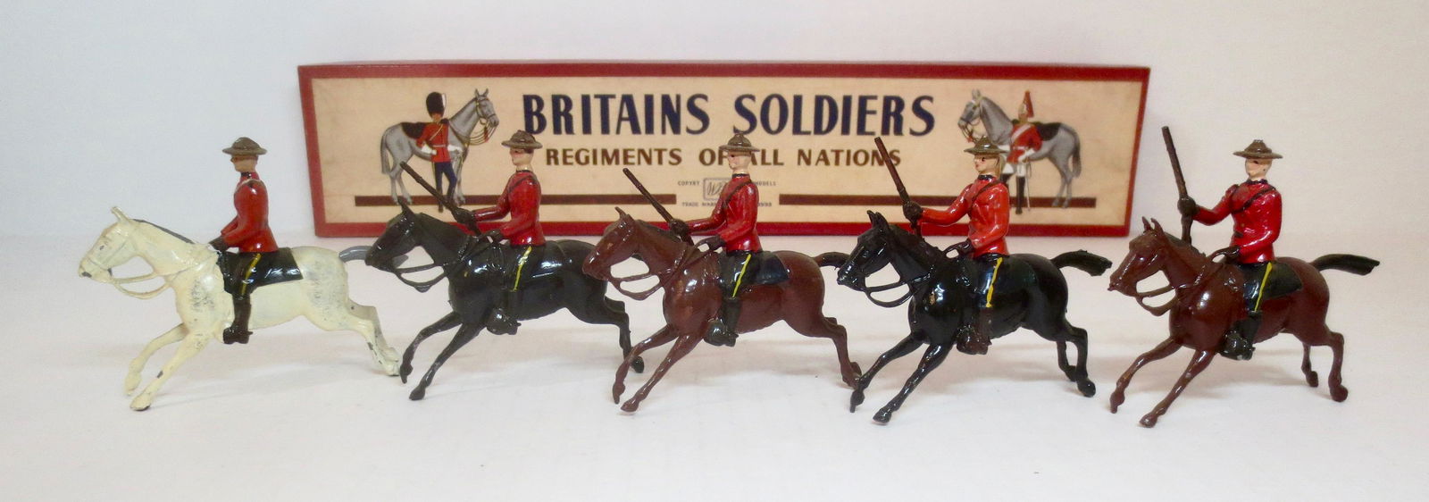 Britains #1349 Royal Canadian Mounted Police: Post war issue. 5 pieces. Excellent condition, with original ROAN box. Box excellent.