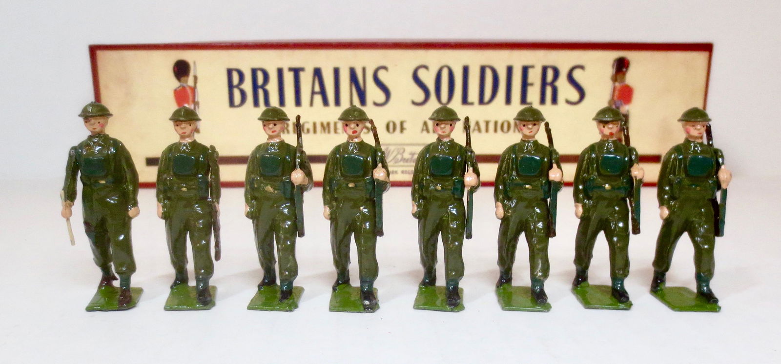 Britains #1858 Infantry in Battledress: Post War, circa 1946-59. 8 pieces. Excellent condition, with original ROAN box. Box excellent.