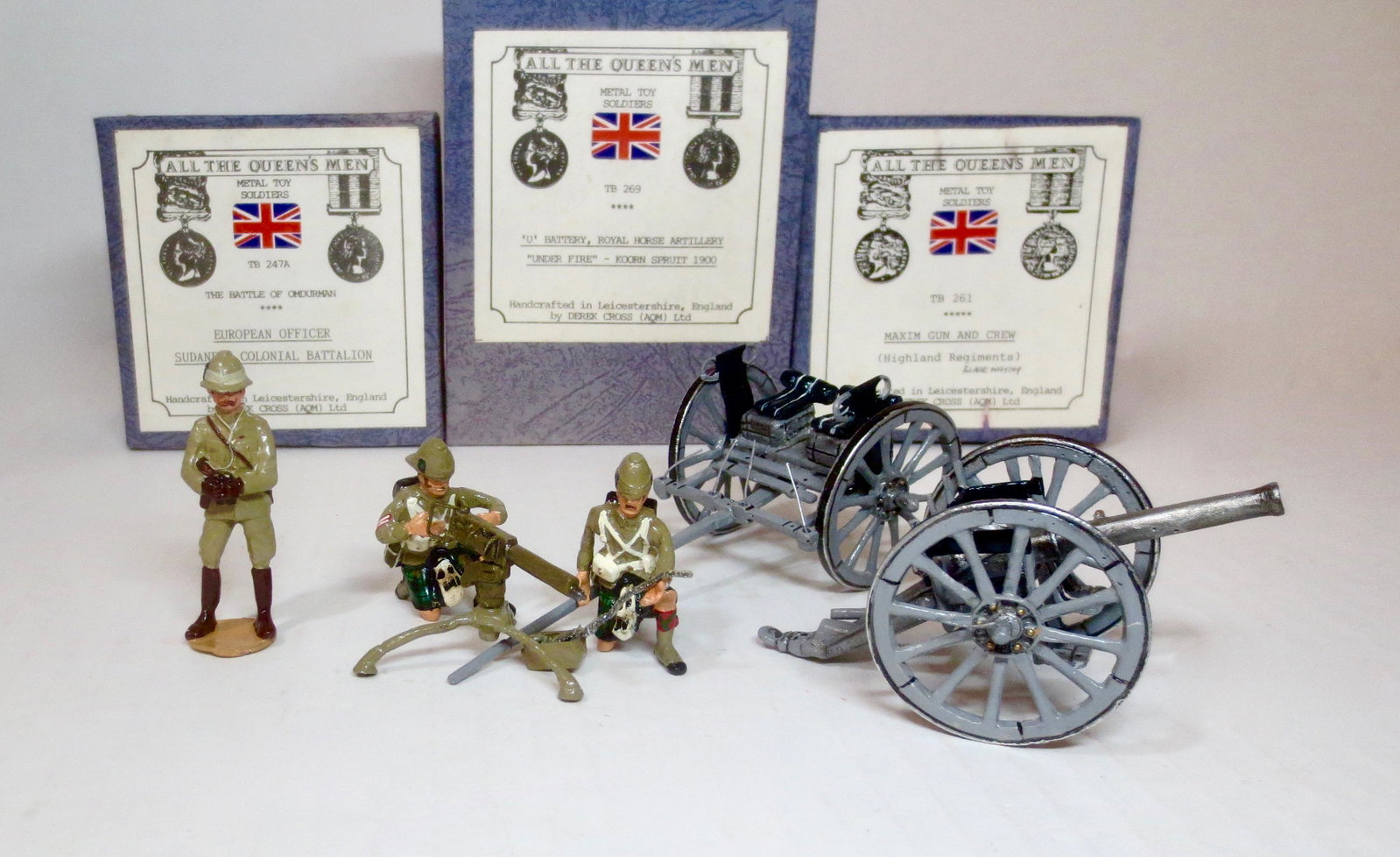 All The Queens Men Assortment: Includes; TB247A European Officer of the Sudanese Colonial Battalion, #TB261 Maxim Gun and Crew, and Field Gun & Limber of The Royal Horse Artillery. 7 pieces. Excellent condition. Boxes very good.