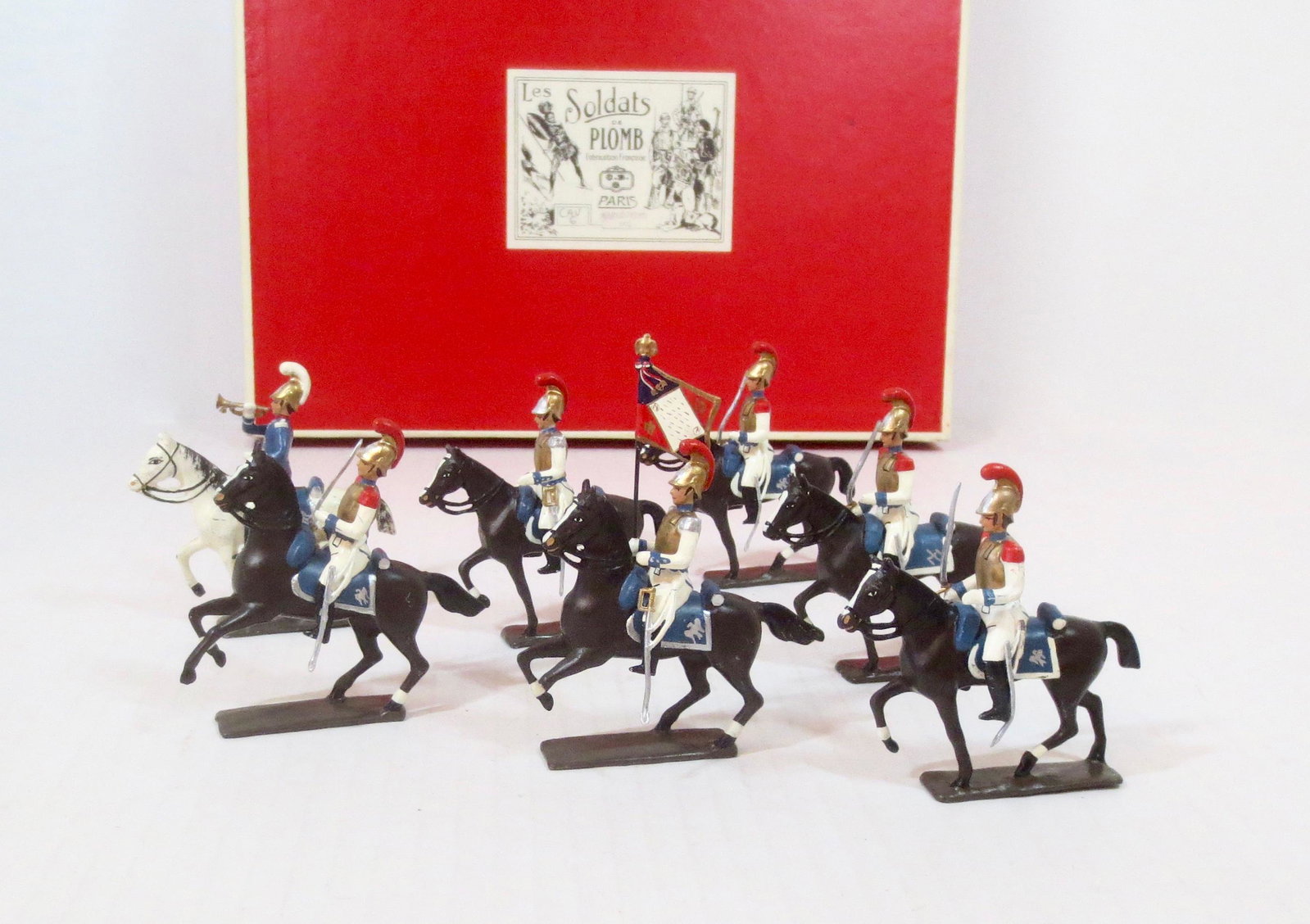 Mignot Heavy Cavalry Men of 1812: Post war issue. 7 pieces. Excellent overall condition (one horse hoof broken off, included for repair). Box excellent.