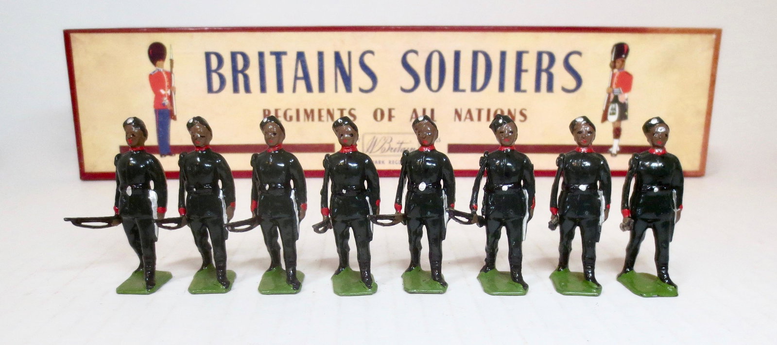 Britains #197 Gurkha Rifles: 1st King George V's Own, The Maulan Regiment. Post war issue in original ROAN box. 8 pieces. Excellent condition. Box very good, with some fading on the top sides.