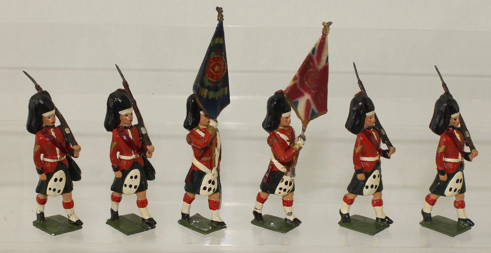 Britains Set #2111 Black Watch Color Party: Color Party of the Black Watch. Made 1956-60. 6 Pieces. Condition Good to Excellent. Paint Damage to 1 Flag Bearer. No Box.