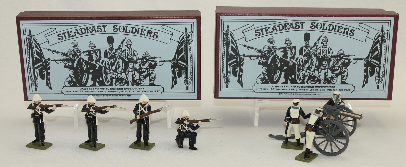 Steadfast Soldiers Lot Gardner MG Royal Marines: Gardner Machine Gun with Crew and Royal Marine Light Infantry. Lot includes Set #SF103 Gardner Machine Gun and Set #SF97A Royal Marines. 8 Pieces. Condition Excellent. Boxes Very Good.