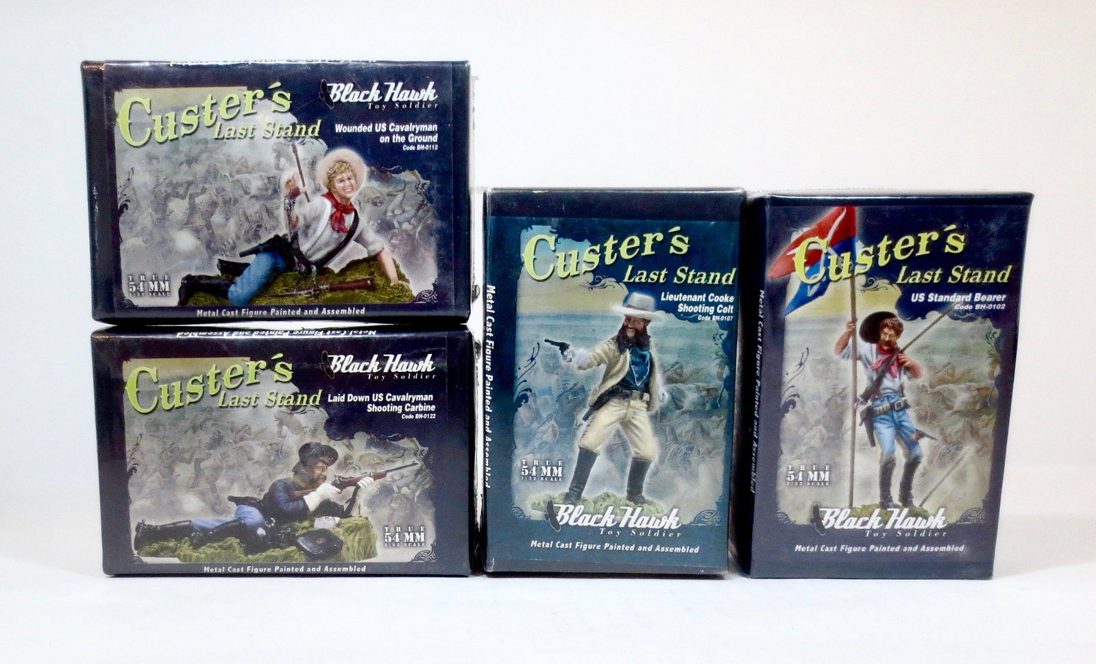Black Hawk Custer's Last Stand Assortment: Includes; #BH0112 Wounded US Cavalryman on the Ground, #BH0122 US Cavalryman Firing Rifle, #BH0107 Lieutenant Cooke Shooting Colt, and #BH0102 US Standard Bearer. 4 pieces. New in cellophane wrapped b