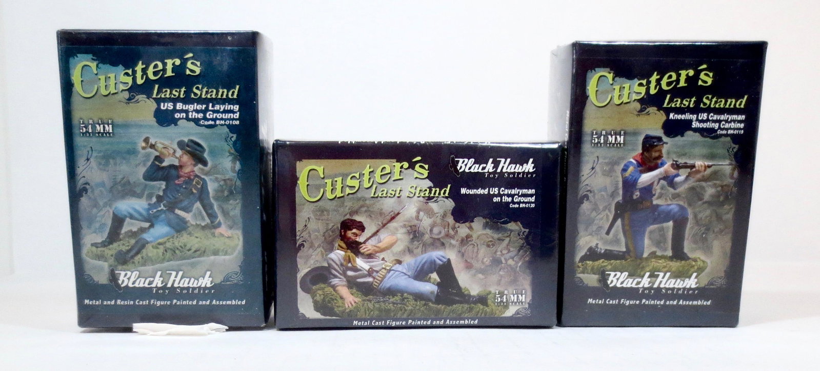 Black Hawk Custer's Last Stand Assortment: Includes; #BH0108 US Bugler Laying on the Ground, BH0119 US Cavalryman Firing Rifle, and BH0120 Wounded US Cavalryman. 3 pieces. New in cellophane wrapped boxes. Boxes in mint condition.