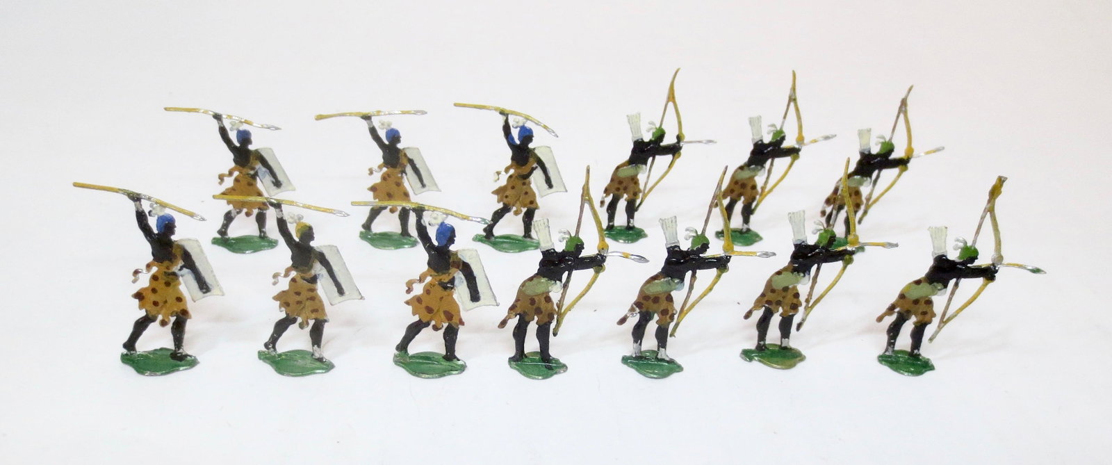 Mid 19th Century Ethiopian Flats: In action, with bows and spears. 30mm. Heinrichsen or other maker. 13 pieces. Excellent condition. Unboxed.