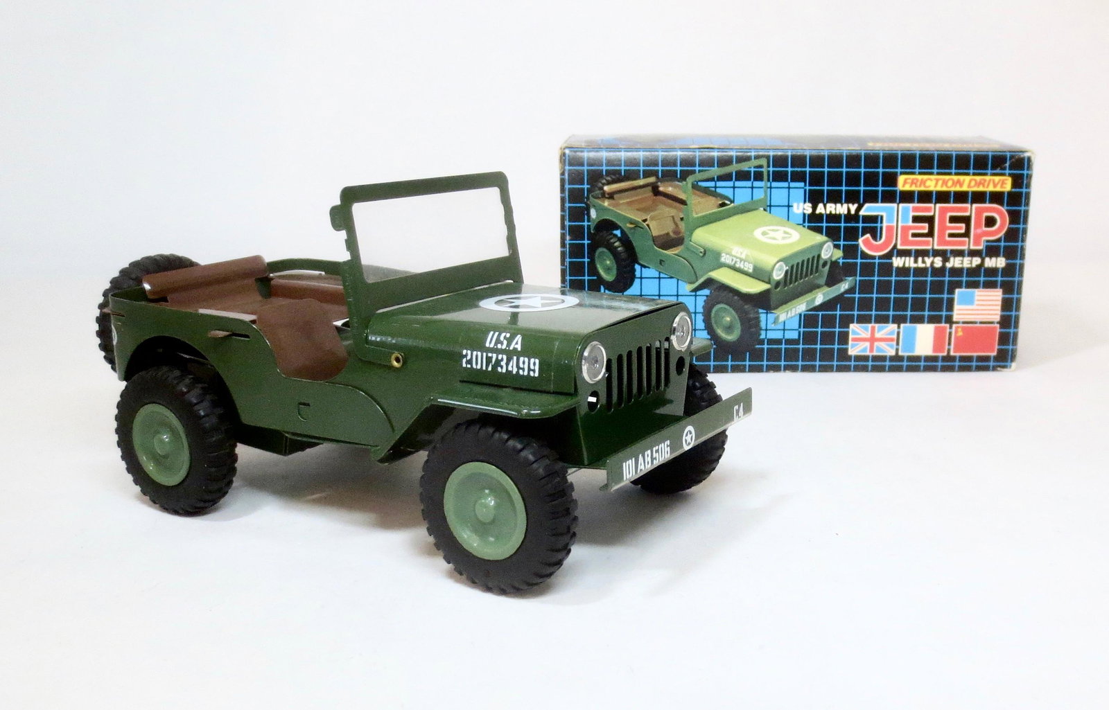 Tin Toy Friction Drive U.S. Army Jeep: Measures 6" long. 1 piece. Excellent condition. Box excellent.