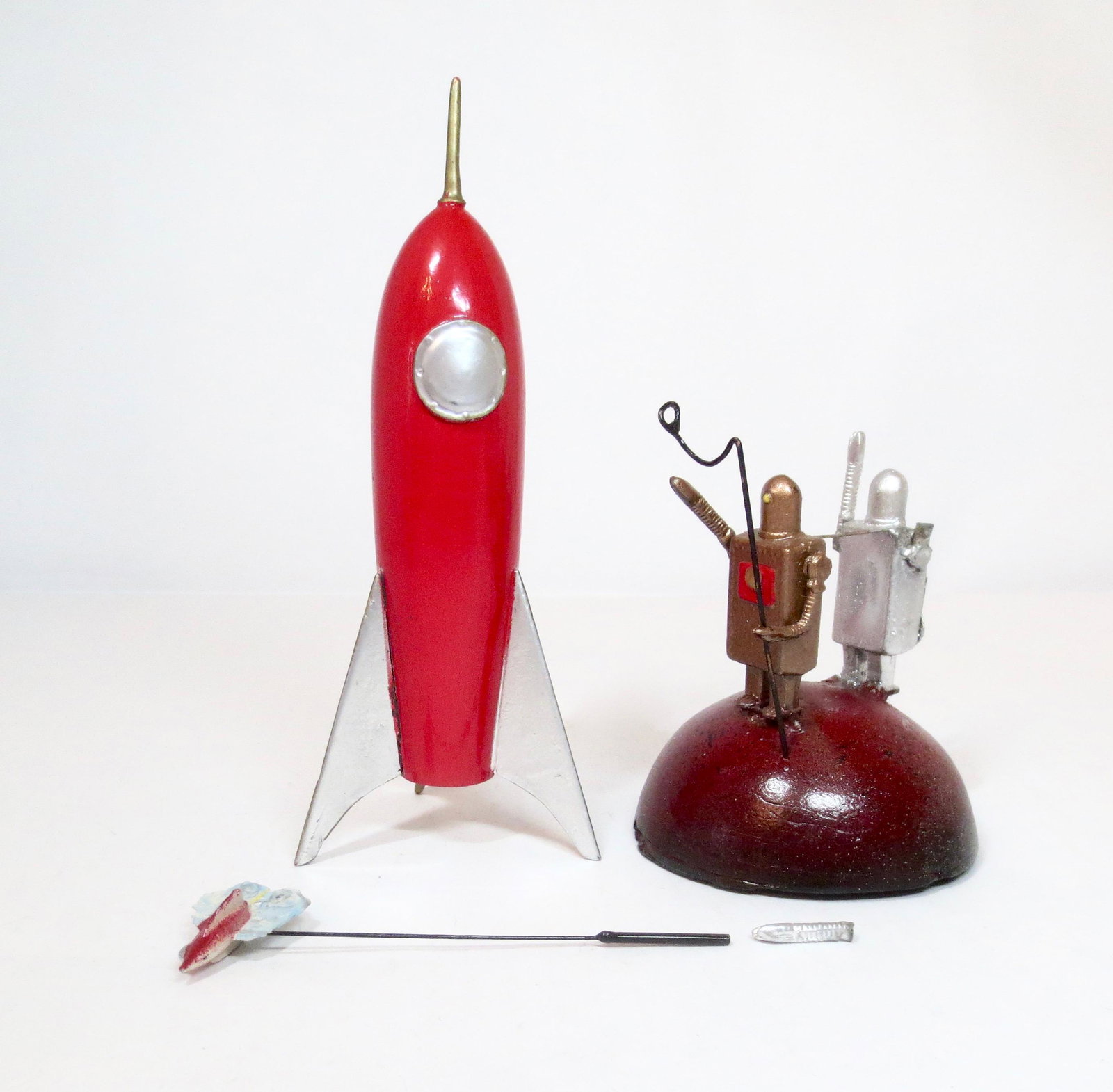 Robots and Rockets: 3 pieces. Excellent to very good condition (one robot arm broken, but included for repair).