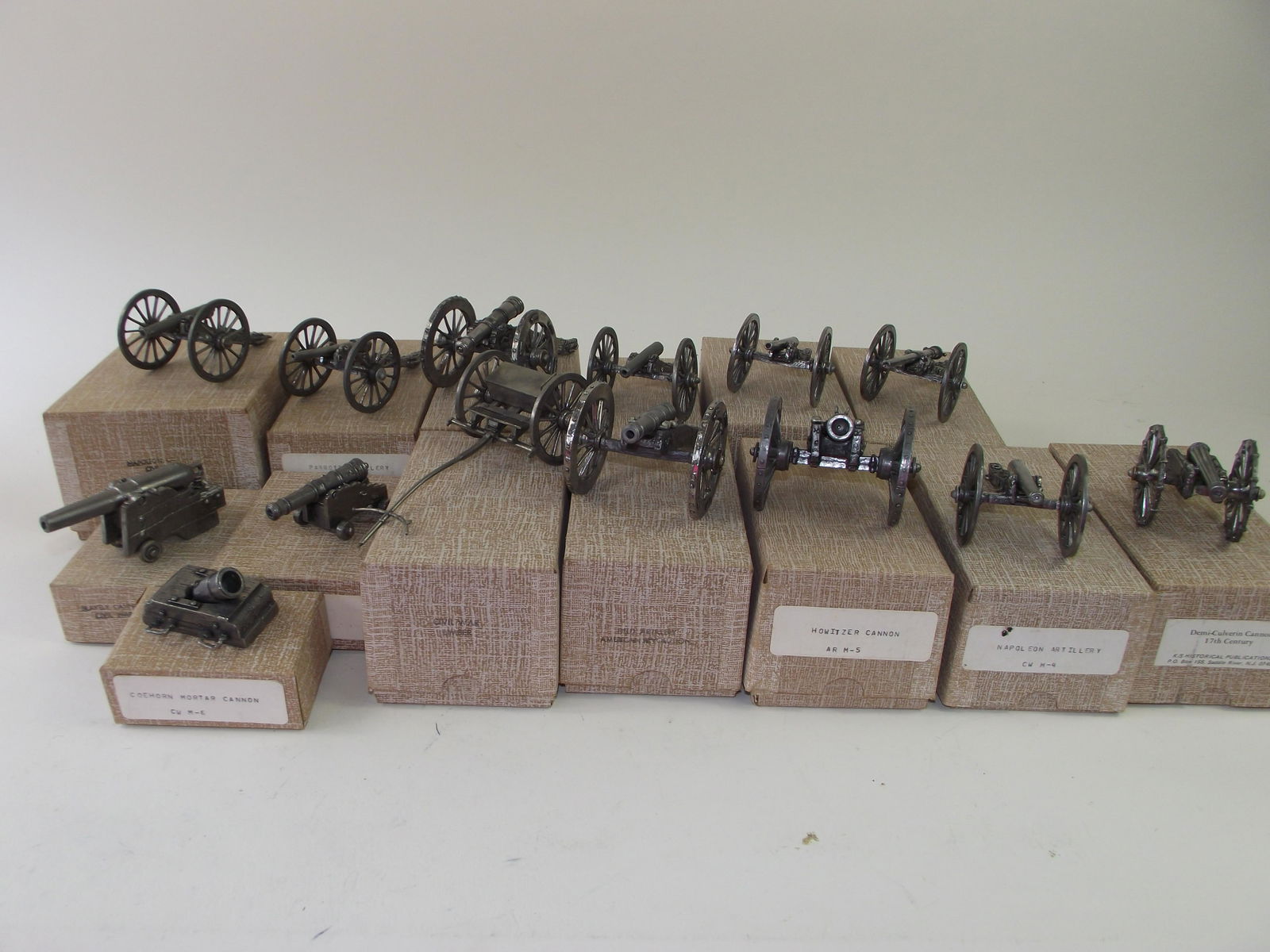 Devereaux Pewter Artillery Collection: 14 pcs, mint with boxes. K/S Publications. Collection contains: Coehorn Motar, Blakely Cannon, Garrison Gun, Civil War Limber, Field Artillery ARW, Howitzer Cannon, Napoleon Artillery, Demi-Culverin C