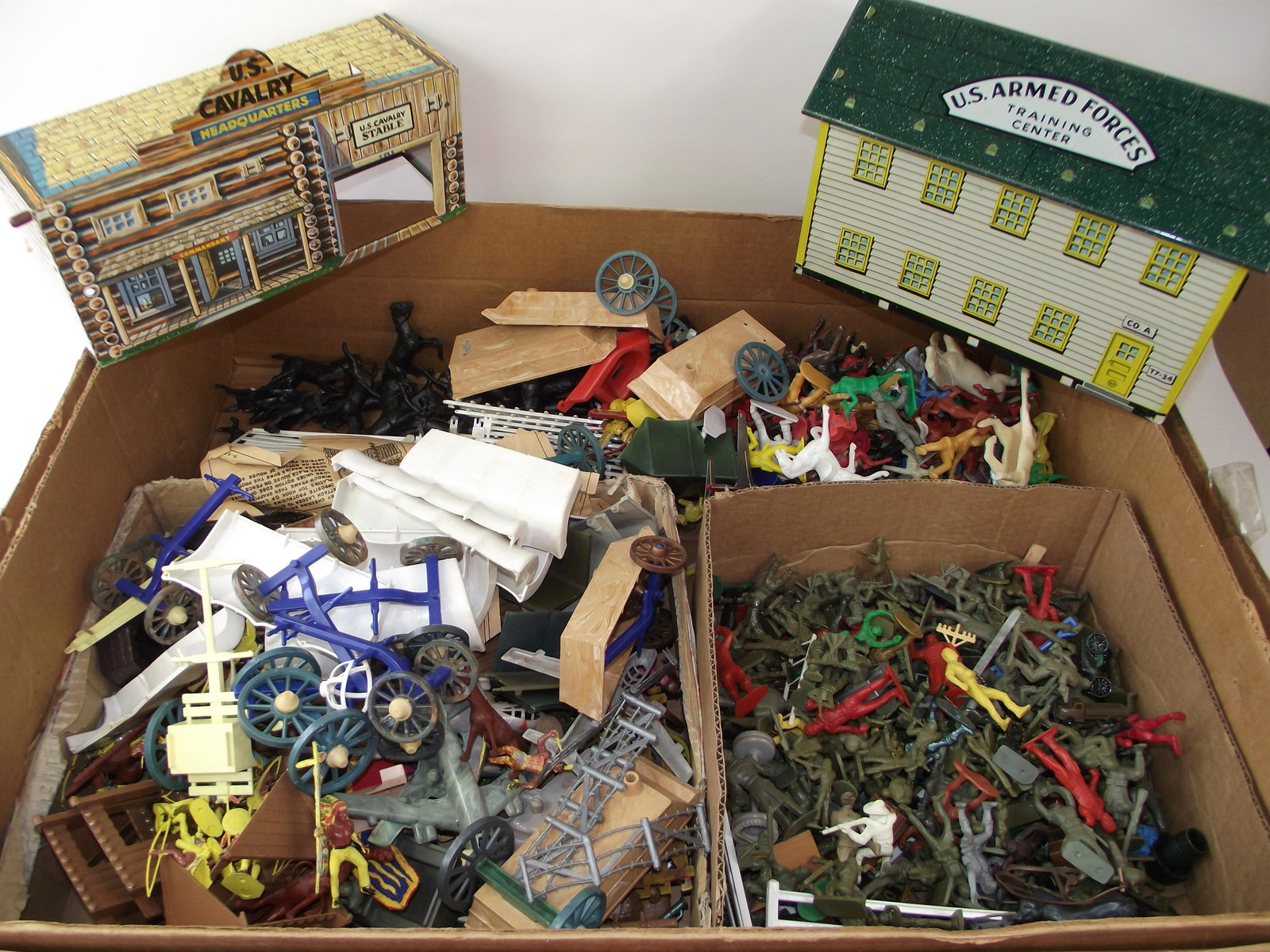 Huge Toybox Collection of Playset Parts: Large accumulation of vintage childhood playset parts and pieces. Plastic soldiers, guns, cannons and other pieces. Manufacturers include Marx MPC, Timmee, Rel, and other brands. Hard and soft plastic