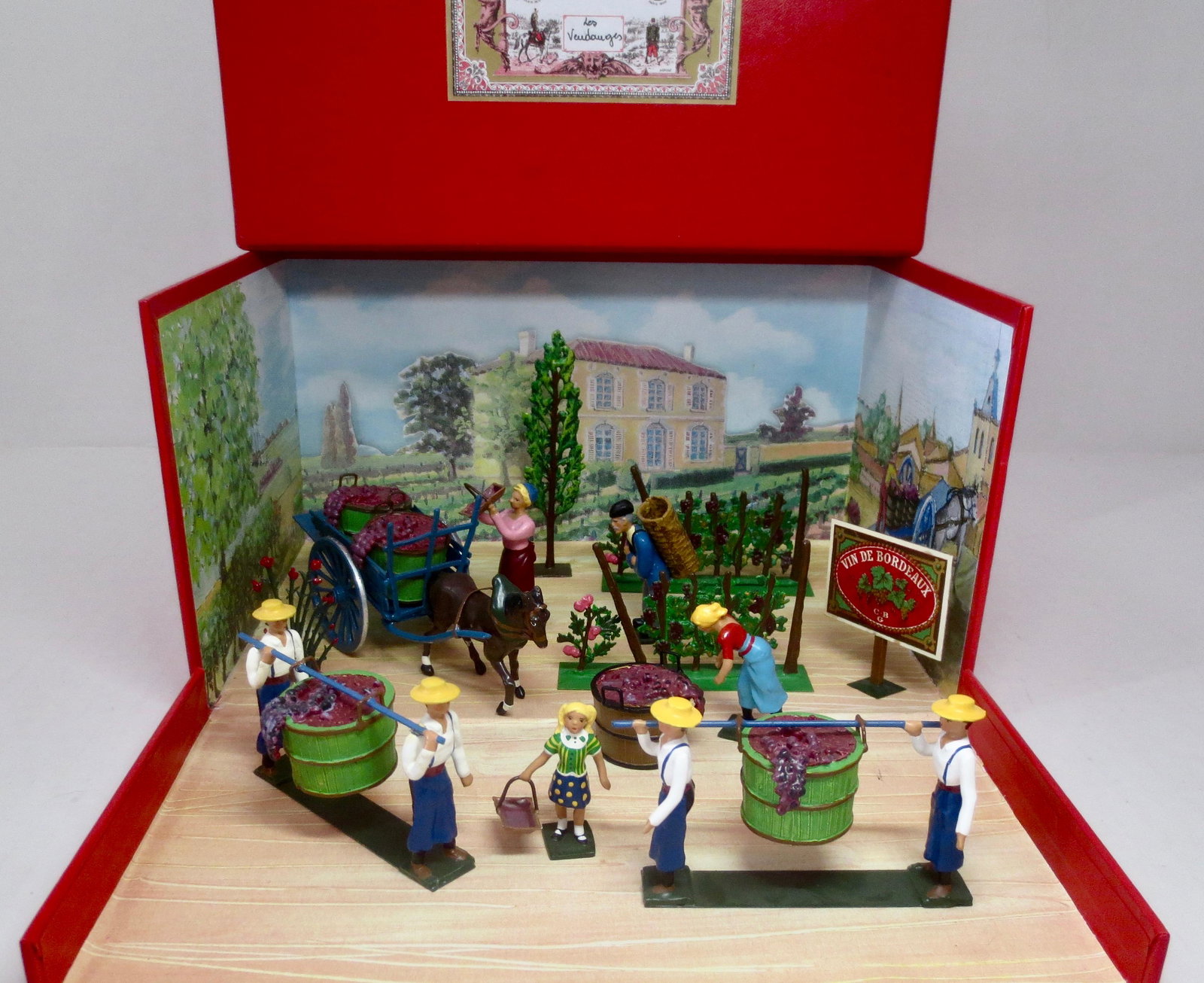 Mignot "The Vineyard" Diorama: Lovely scenic set featuring workers at harvest time. 16 pieces. Near mint condition. Box excellent.