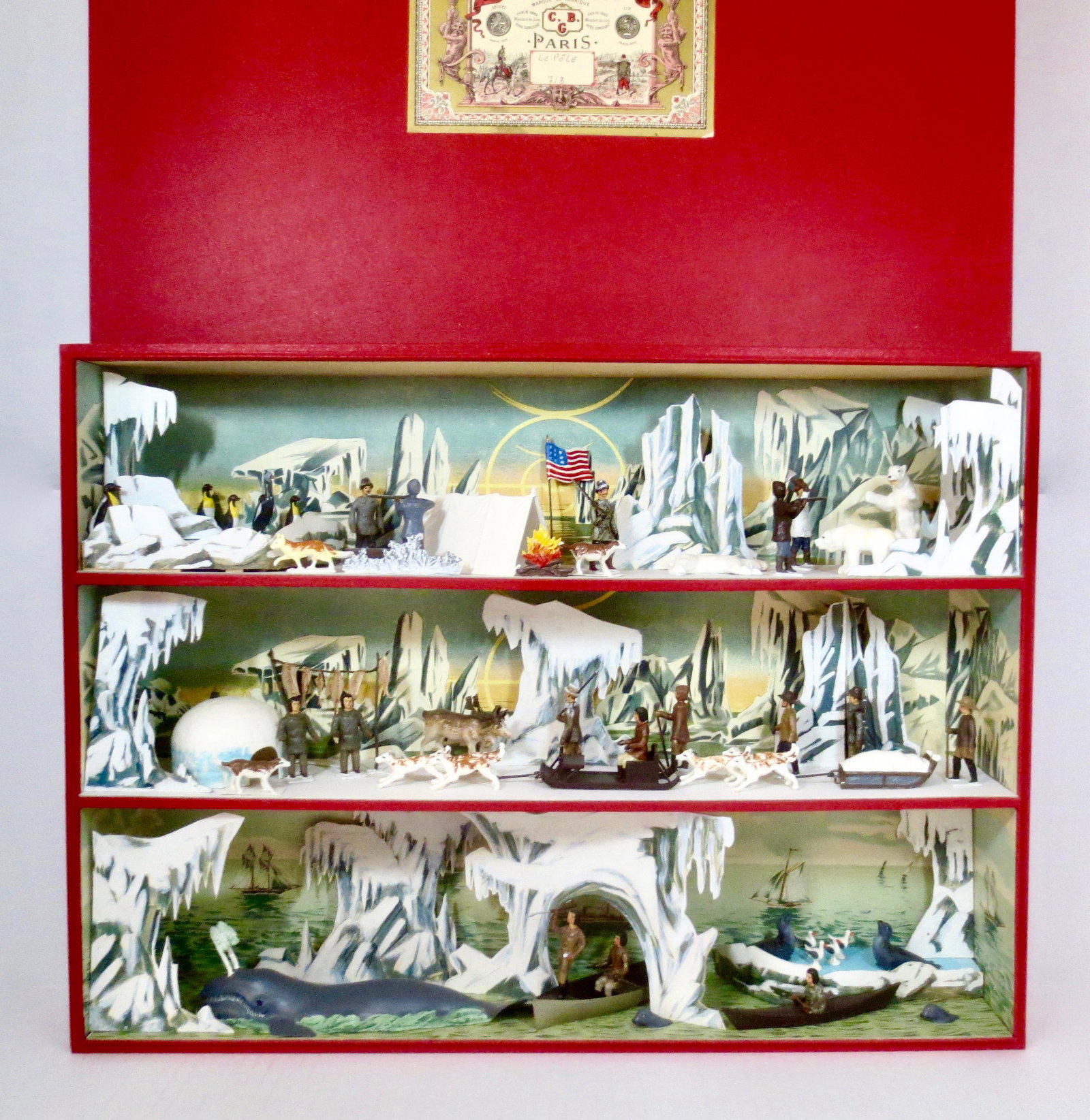 Mignot "le Pole" Diorama: Magnificent three level diorama featuring scenes from American explorer Robert Perry's famed expedition to reach the North Pole. Includes: Perry planting the American flag, wild life, canoes, whale, a