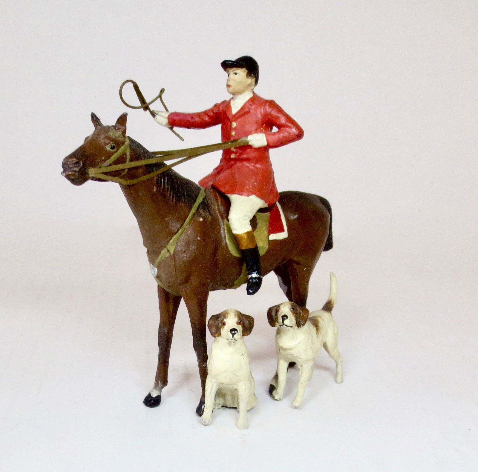 Heyde Large Scale Mounted Huntsman: Prewar Huntsman on standing Horse with Hounds attached to horses legs. 125mm tall. Circa 1930. 1 Piece. Excellent condition. Unboxed.