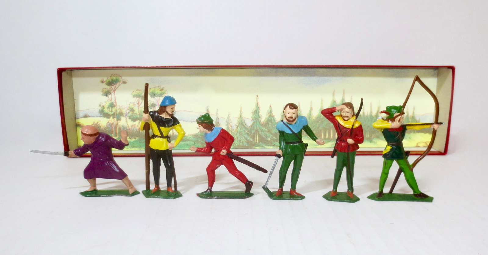 AHI Japan #5700R Robin Hood Set: Post war issue. Robin with his band of Merry Men. Includes; Friar Tuck, Little John, Will Scarlet and more. 60 mm scale. 6 pieces. Excellent condition. Plain red craft box with scenic insert very good