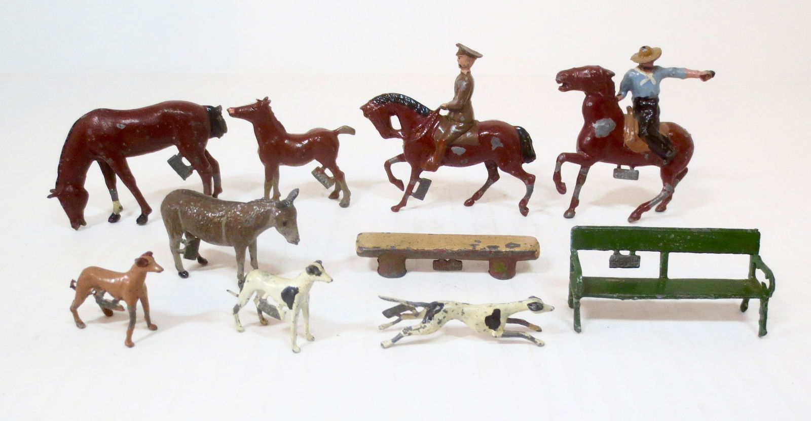 Britains Assortment with RARE Export Tags: Circa 1945-1955. 10 pieces. Very good to good condition (Cowboy missing pistol tip). Unboxed.