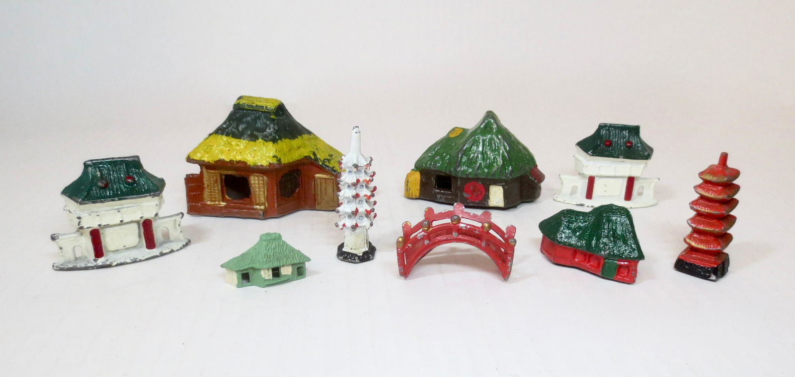 Hollowcast Lead Japanese Village: Measuring 1" to 2-1/2" tall. 9 pieces. Excellent condition. Unboxed.