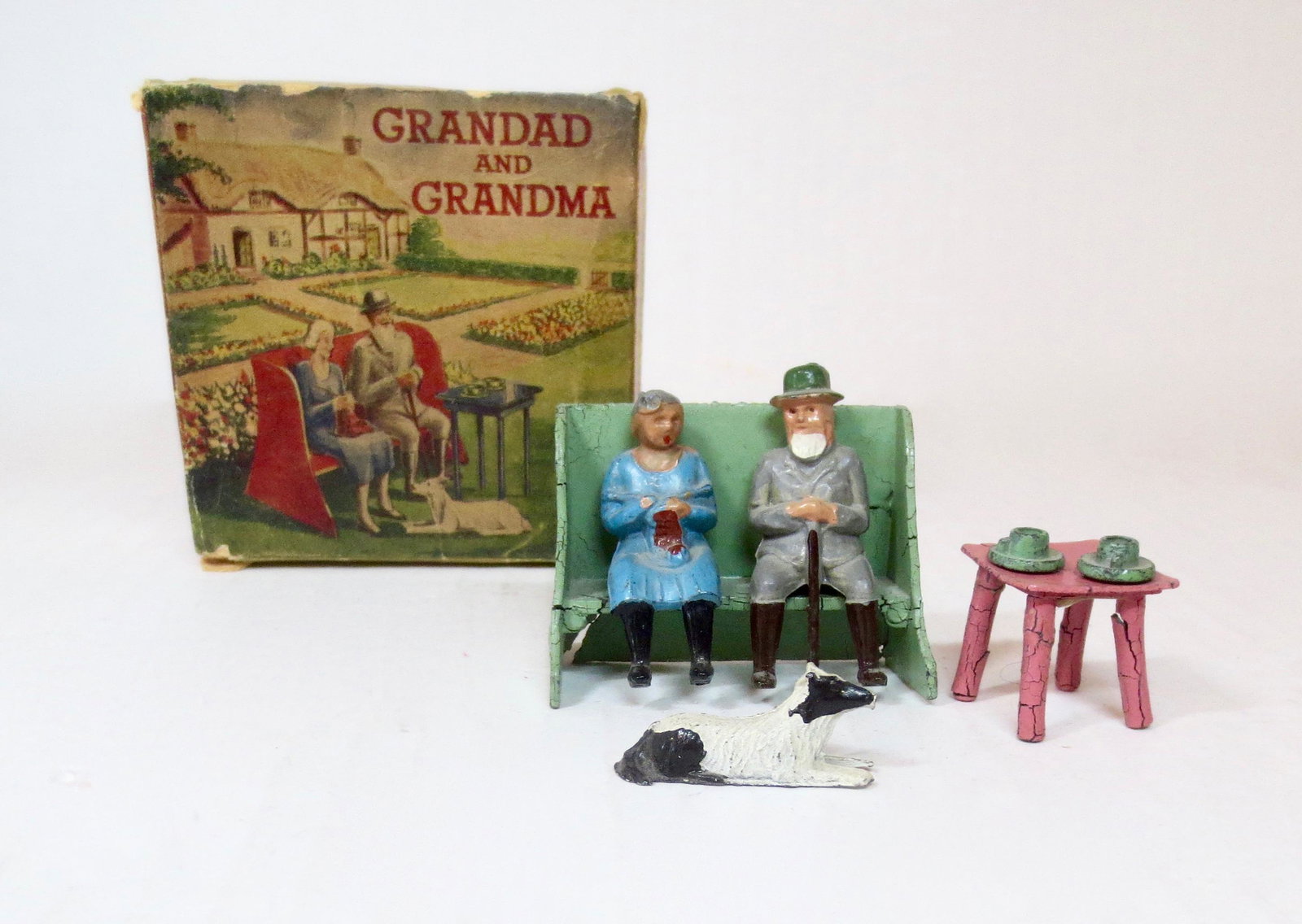 Crescent Grandad and Grandma Boxed Set: Hard to find complete set, includes: Grandma, Grandpa, Bench, Side Table with Tea Cups, and Dog. Excellent to good condition (bench and side table have stress cracks). Box fair, with surface wear and 