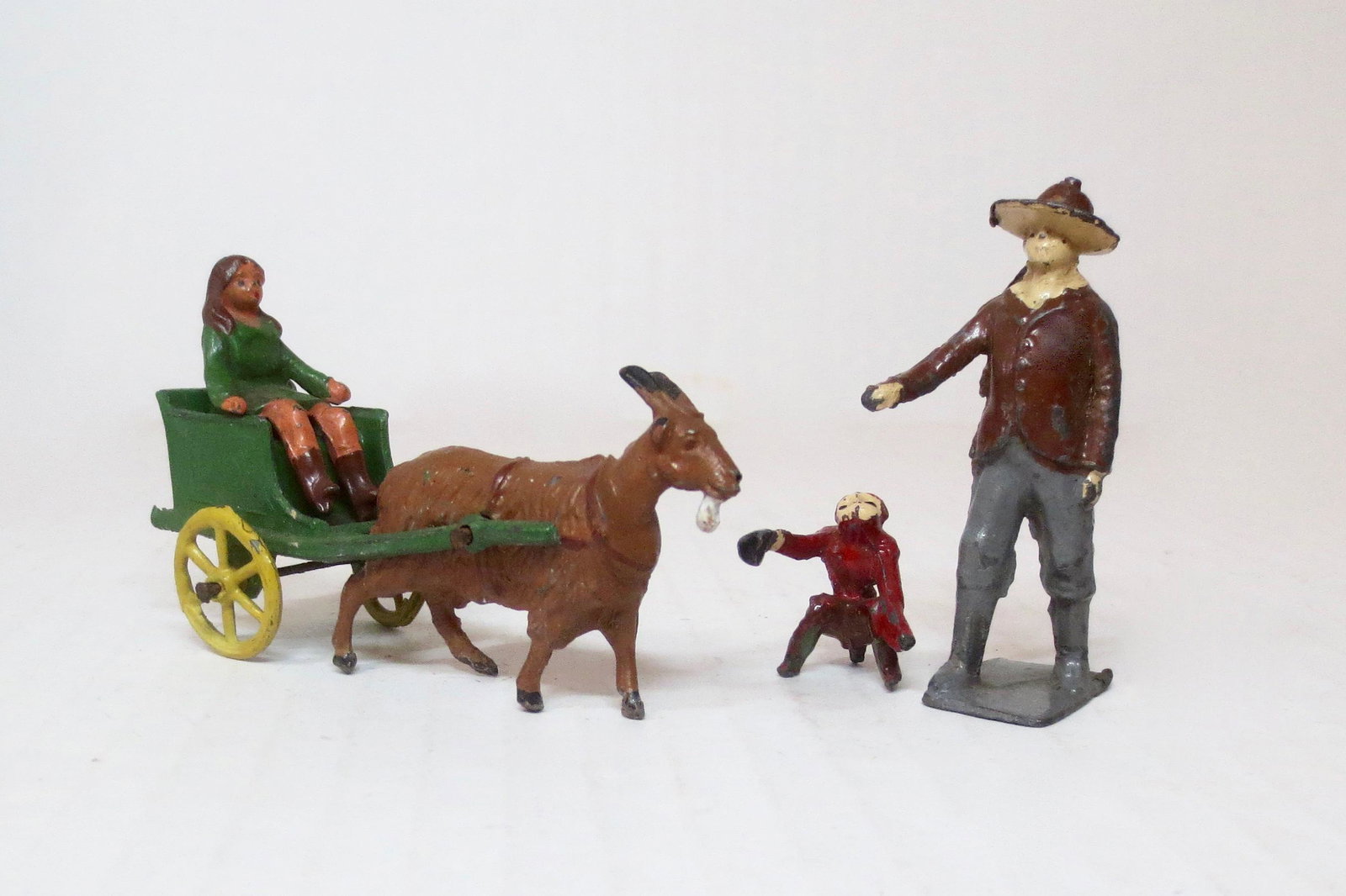 Charbens RARE Civilian Figures: Pre war issue. Includes: Girl riding in Goat Cart, Organ Grinder and Monkey with collection cup in hand. 5 pieces. Excellent condition. Unboxed.