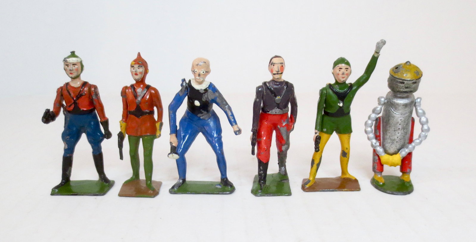 Britains VERY RARE Buck Rogers Complete Series: Space traveling Buck Rogers with Wilma Deering, Dr. Huer, Killer Kane, Princess Ardala, and the ULTRA RARE Meccano Man. Circa 1935 and available for one year only. Britains produced the series of figu