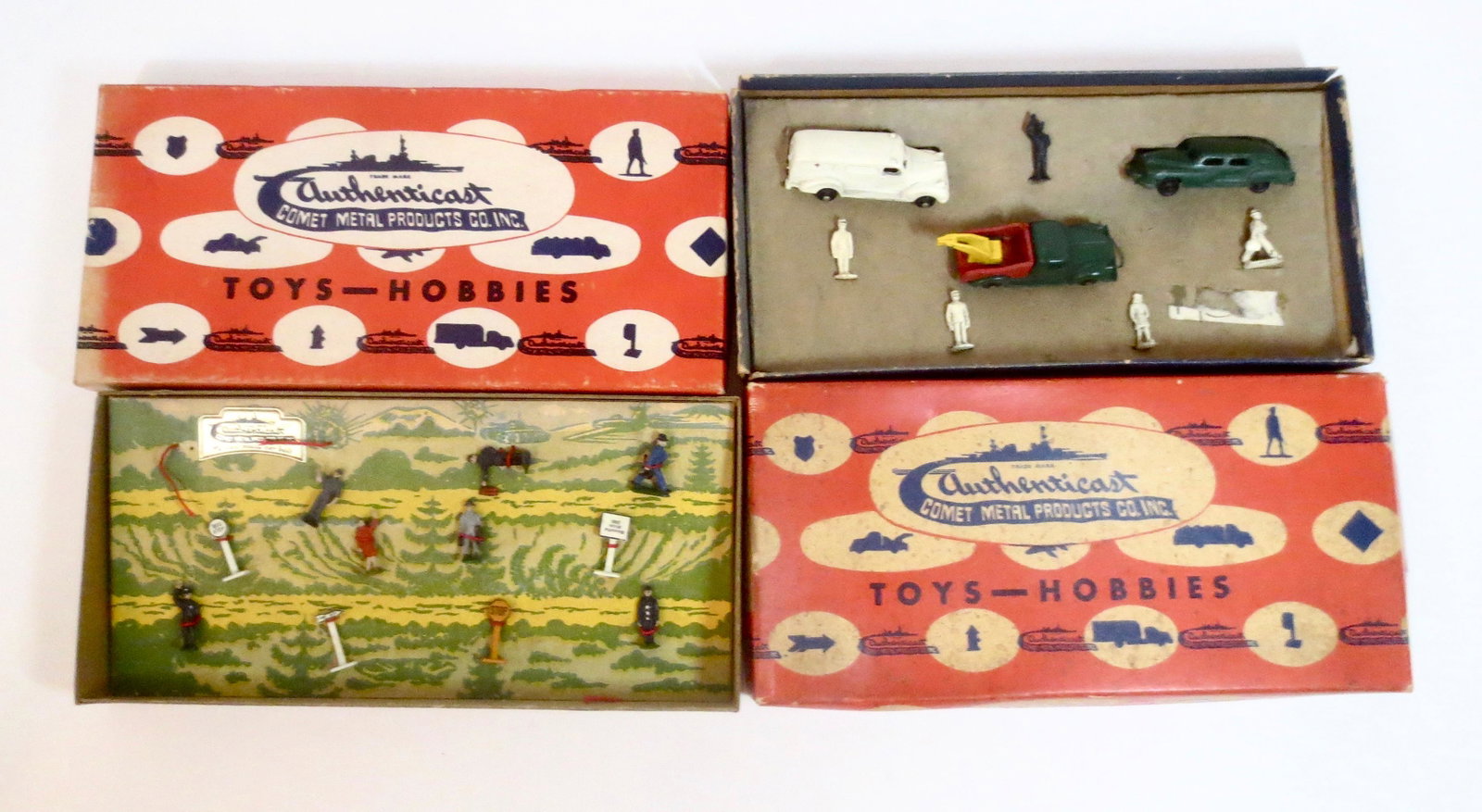 Authenticast Railway Boxed Sets: Train passengers, crew, and transportation cars and figures. 20mm. 19 pieces. Mint to near mint condition. Boxes in good condition, with corner splits.