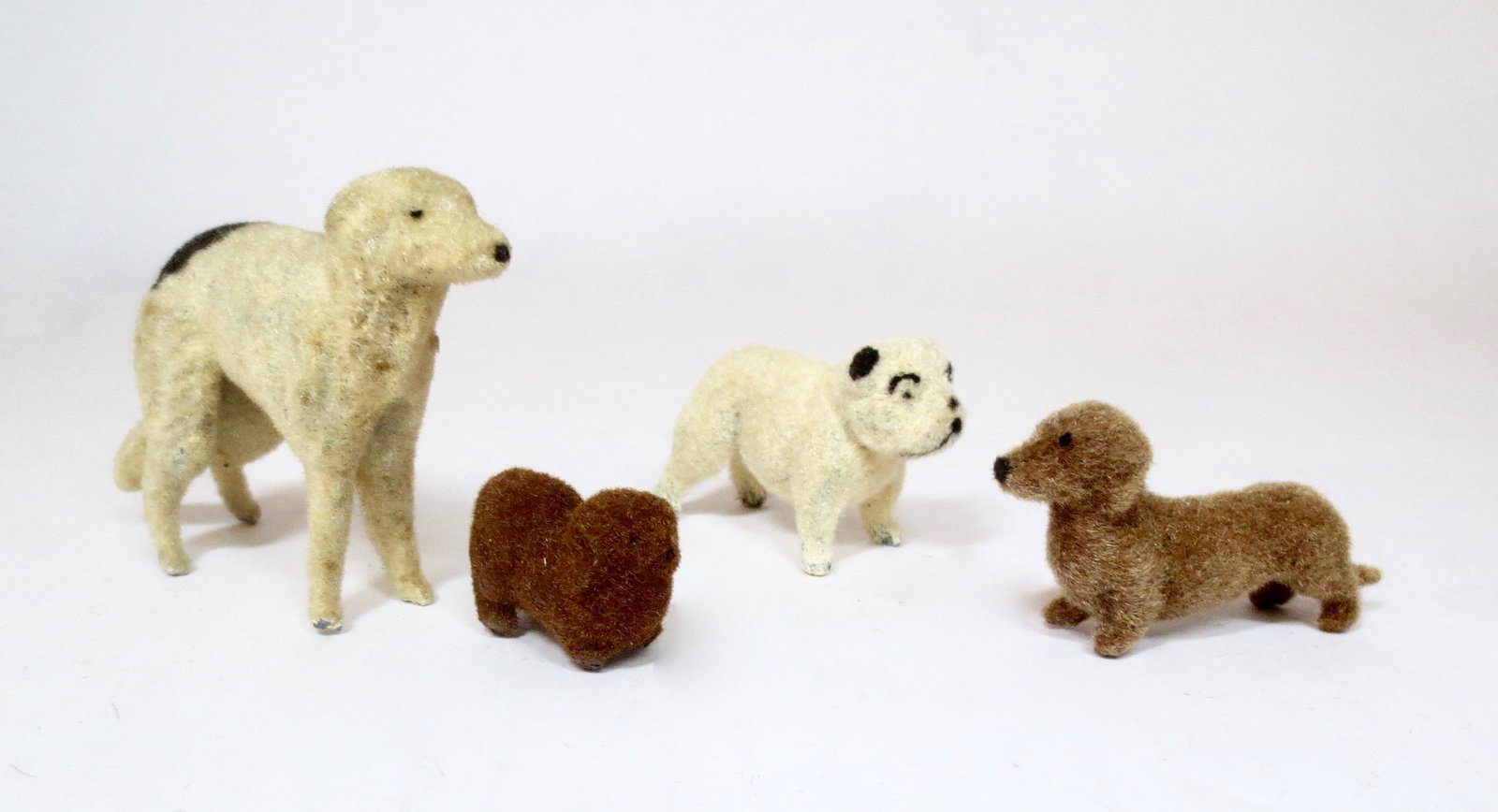 Timpo Flocked Dogs: 4 pieces. Near mint condition. Unboxed.